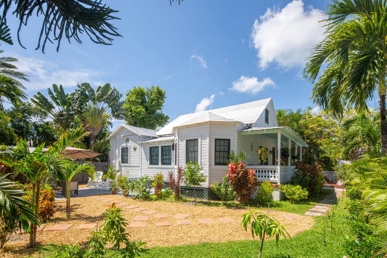 Key West, FL bungalow surrounded by greenery