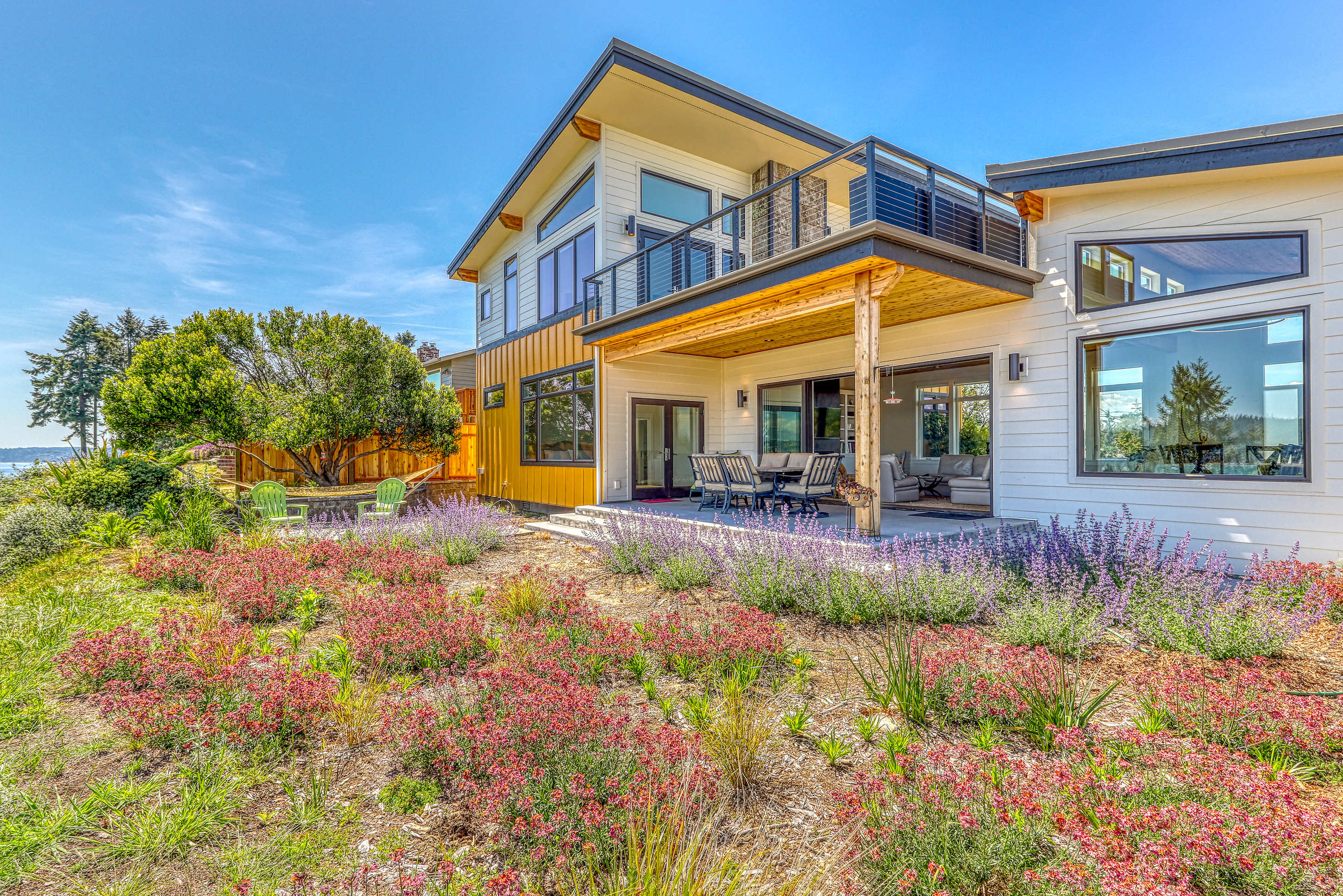 vacation rental in port orchard, wa with two patios and a hammock near the water