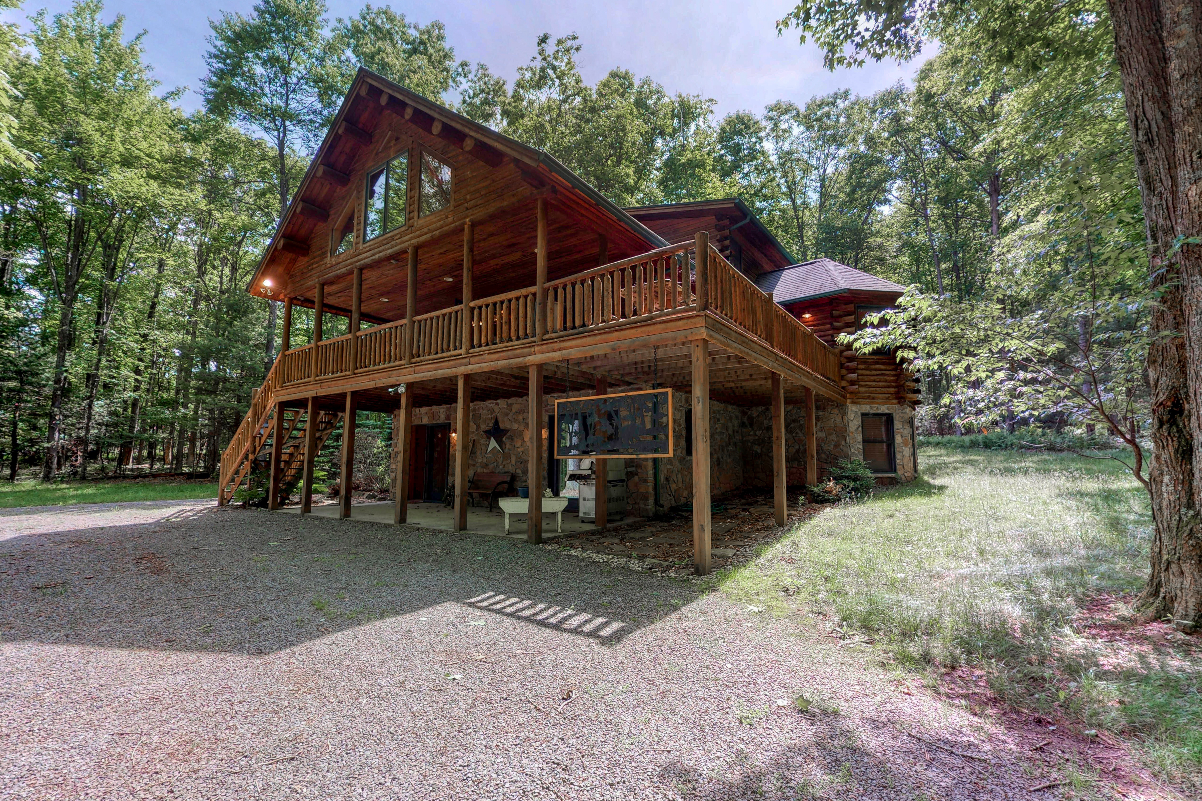 large cabin in swanton, md with a wraparound deck