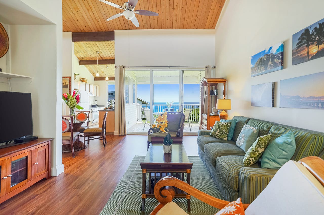 Fully furnished living room of a vacation rental in Princeville, HI
