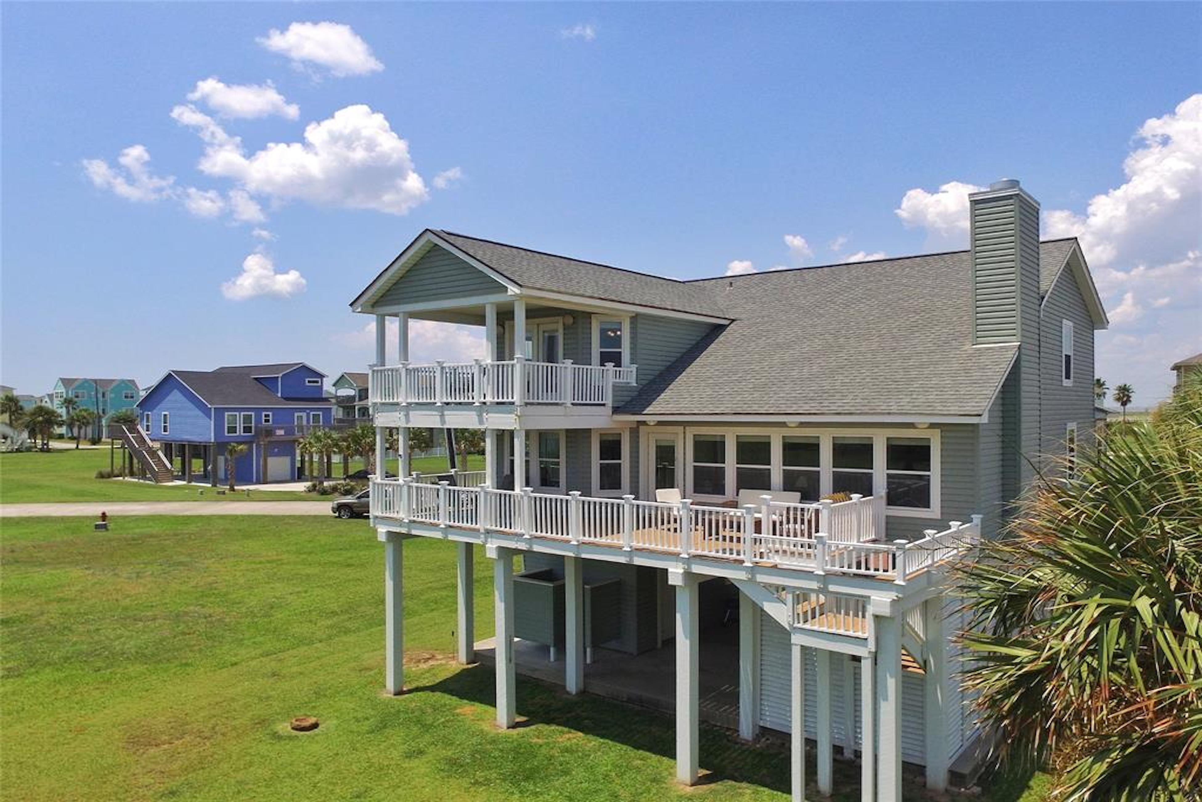 beach home in galveston, texas with fully furnished balconies and ocean views