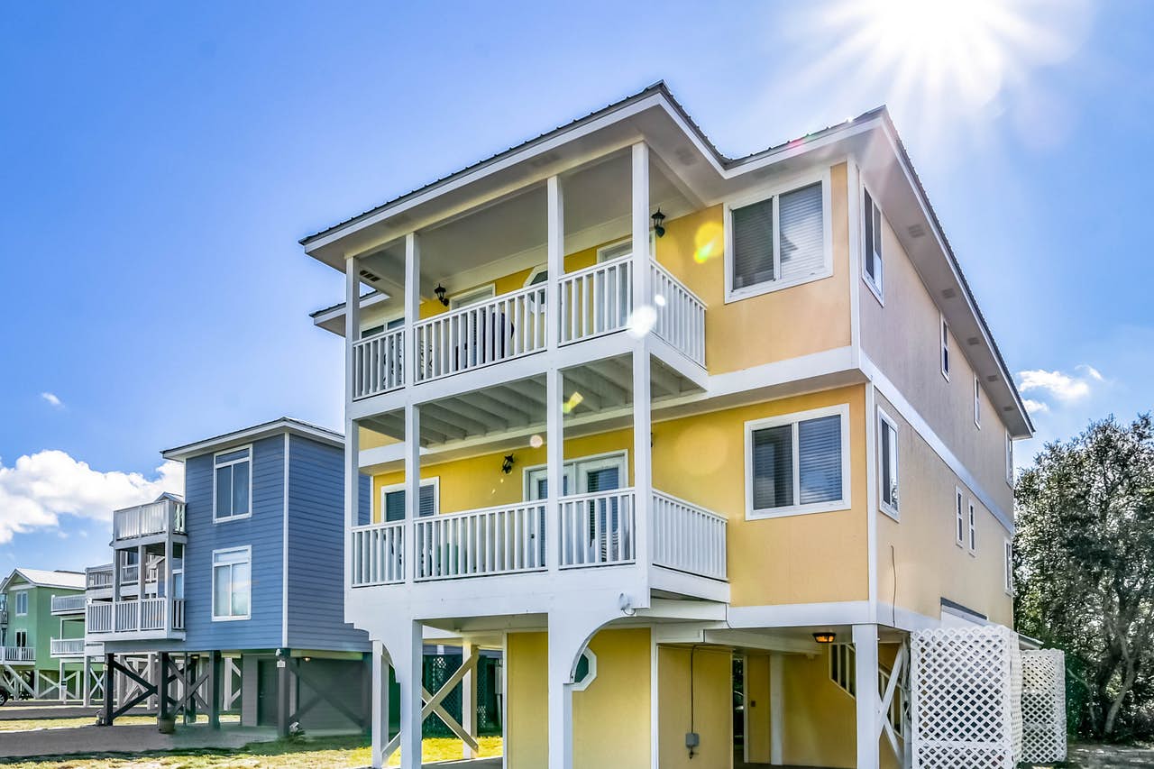 Yellow beach house rental located in Gulf Shores, AL