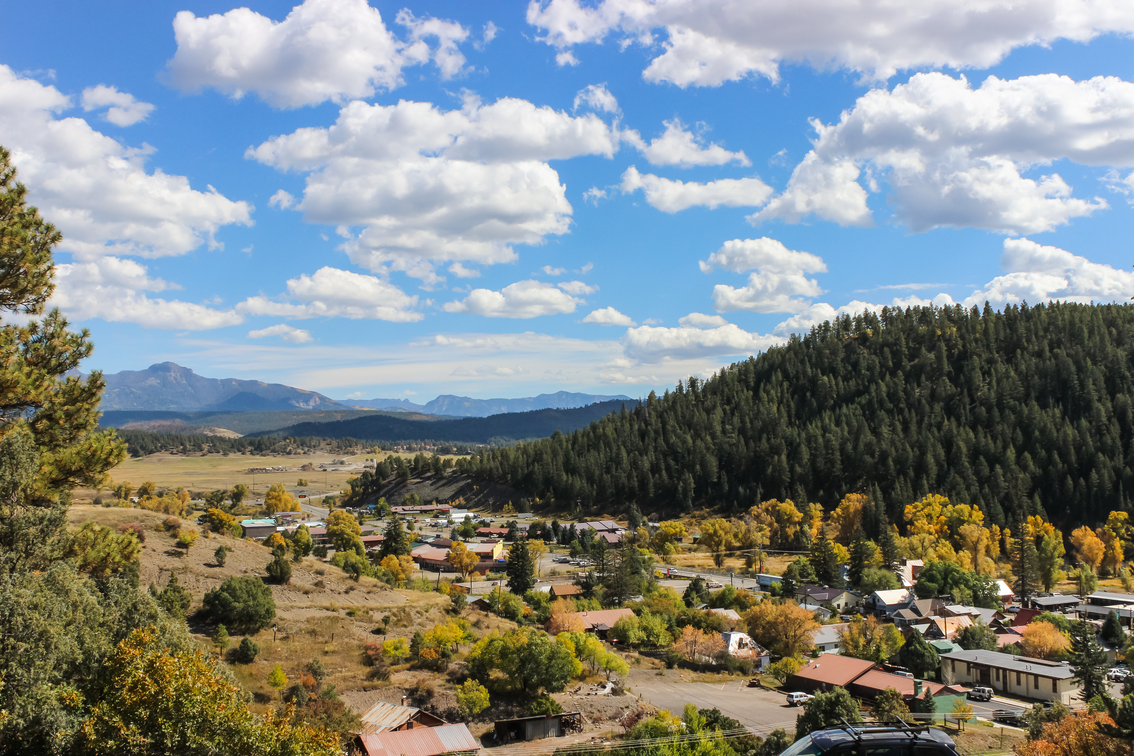 a valley in pagosa springs with fall colors and mountain views