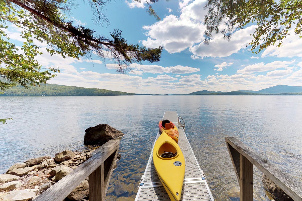 two kayaks sit atop a boat dock in Greenville, ME