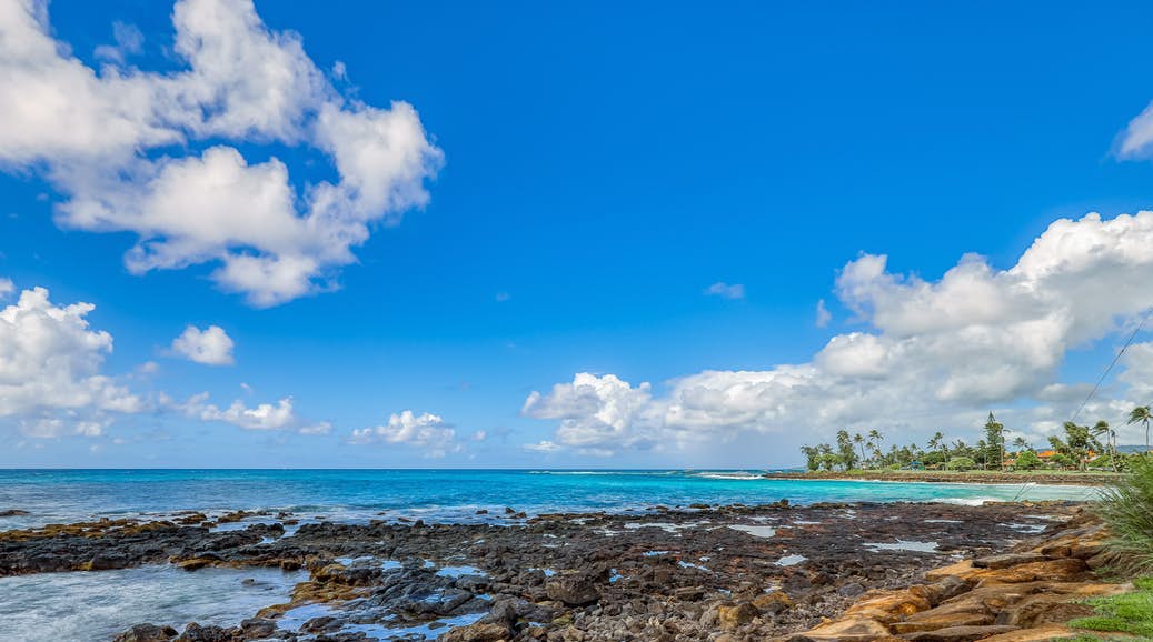 Poipu Bay shoreline in Poipu, HI