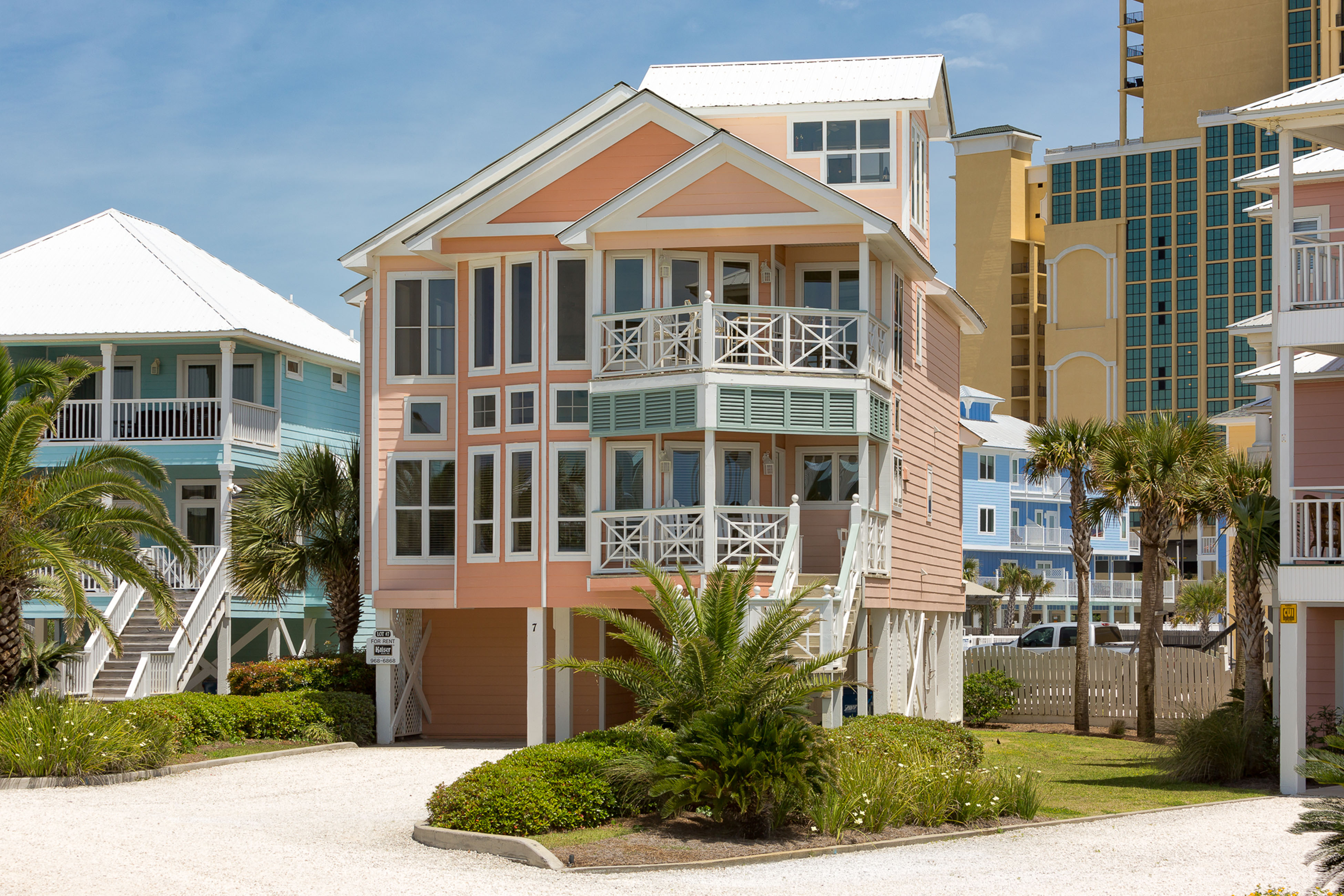 Rows of vacation homes near a large condo complex in Orange Beach, AL