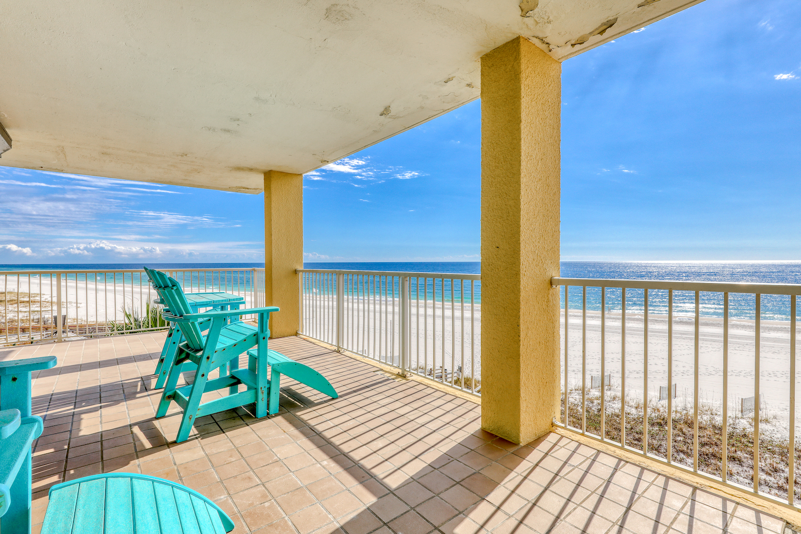 The back patio at a oceanfront condo rental in Orange Beach.