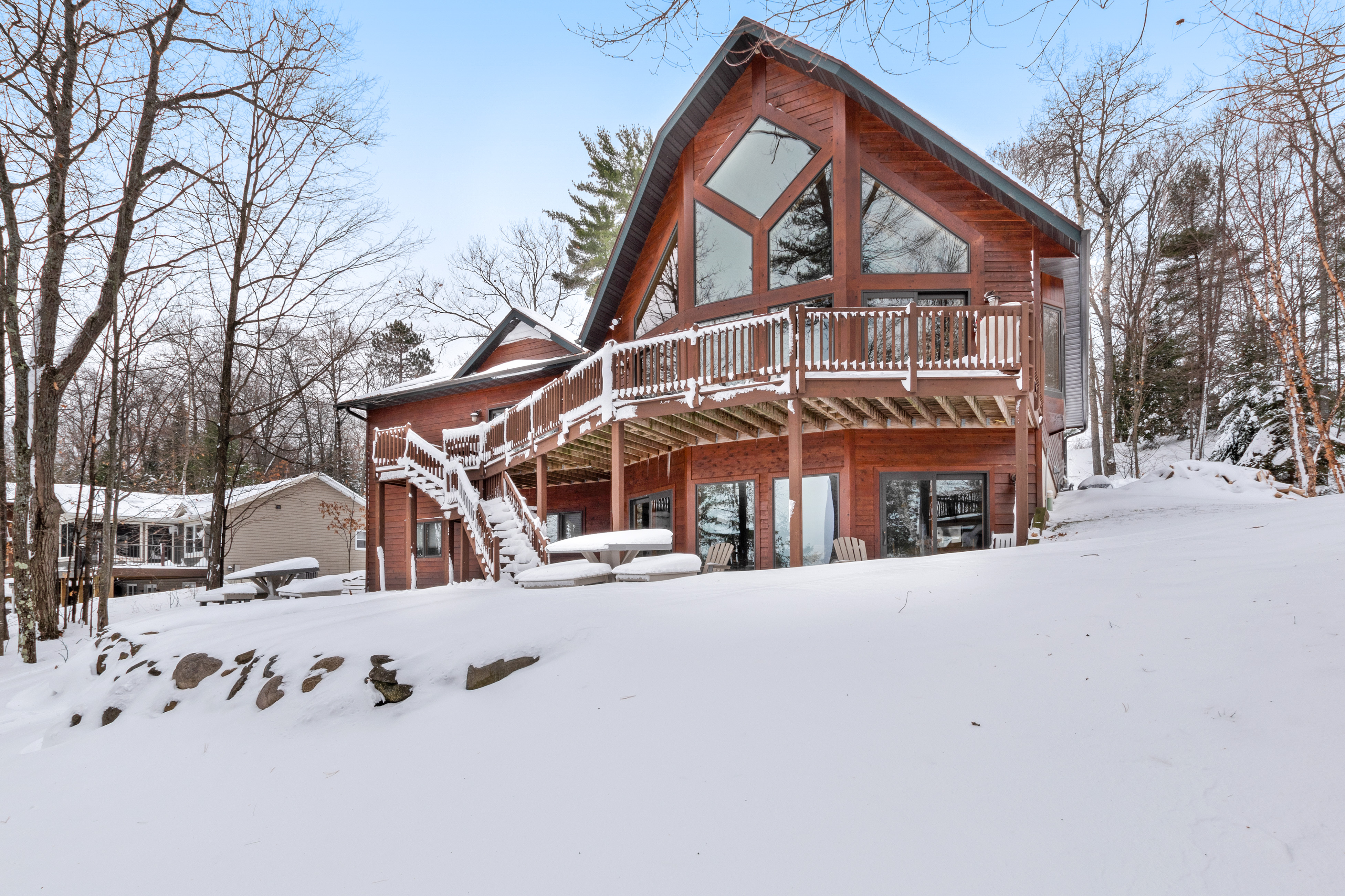 cabin surrounded by snow in Eagle River, WI