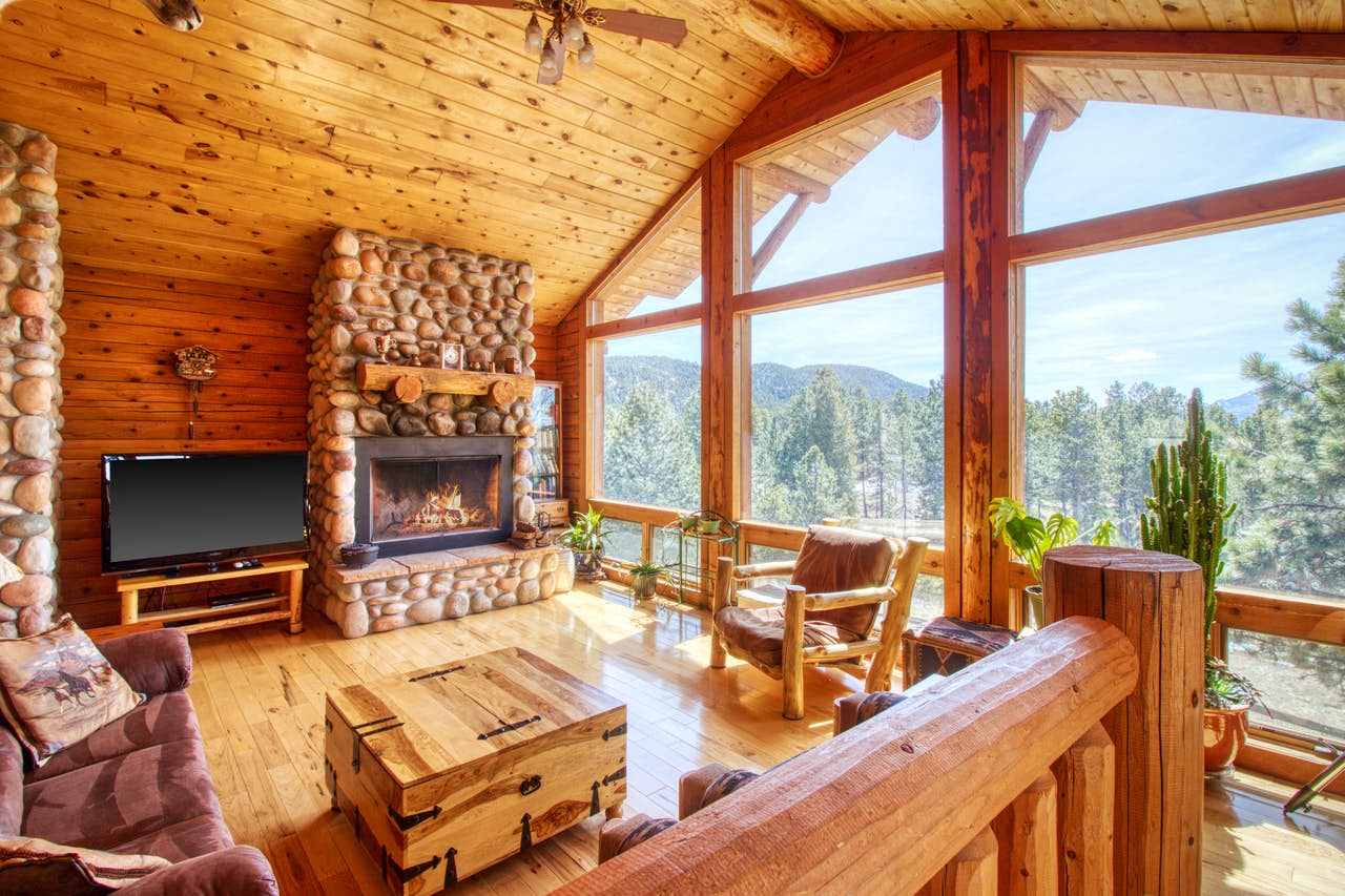 stone fireplace inside colorado cabin