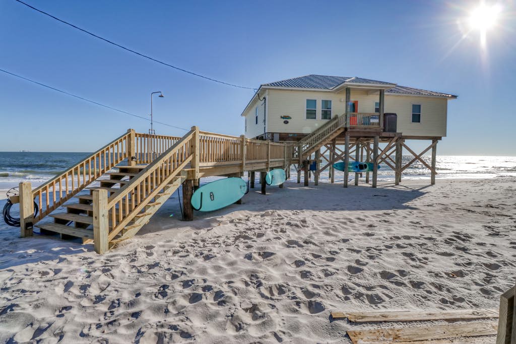 vacation home on stilts right on the beach on Dauphin Island