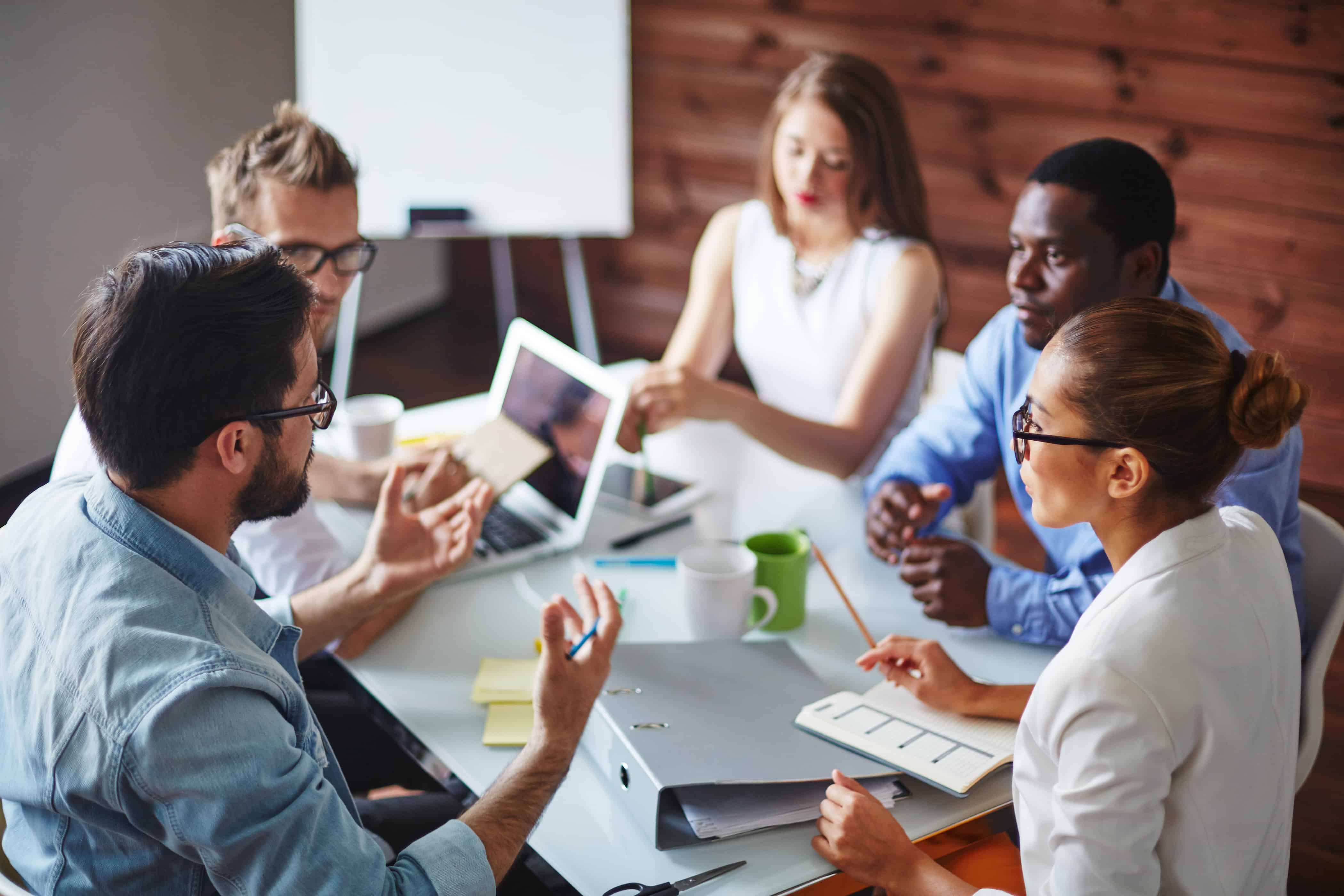 a team in a conference room having a strategic meeting