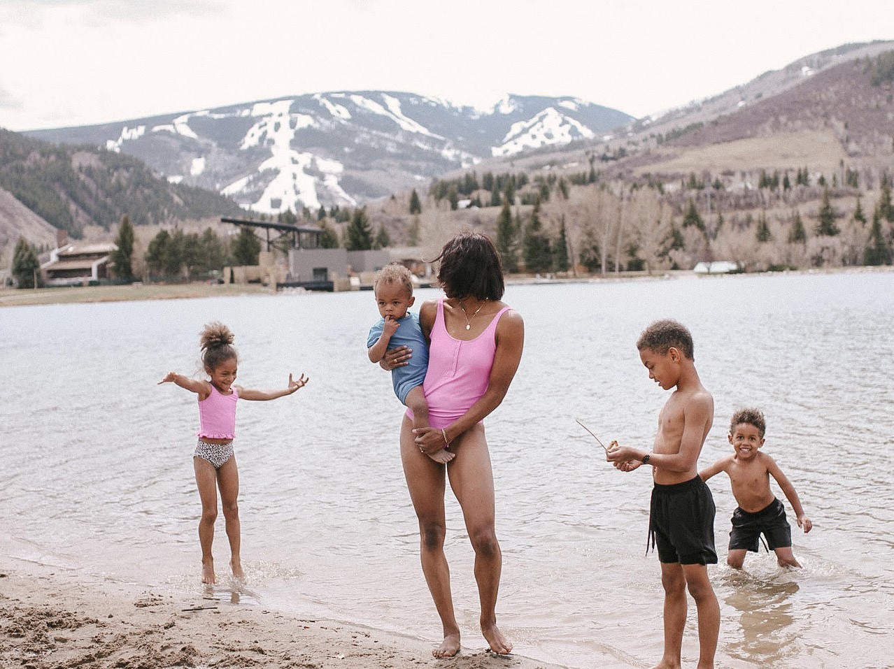 mother with four children play in the river in telluride, colorado