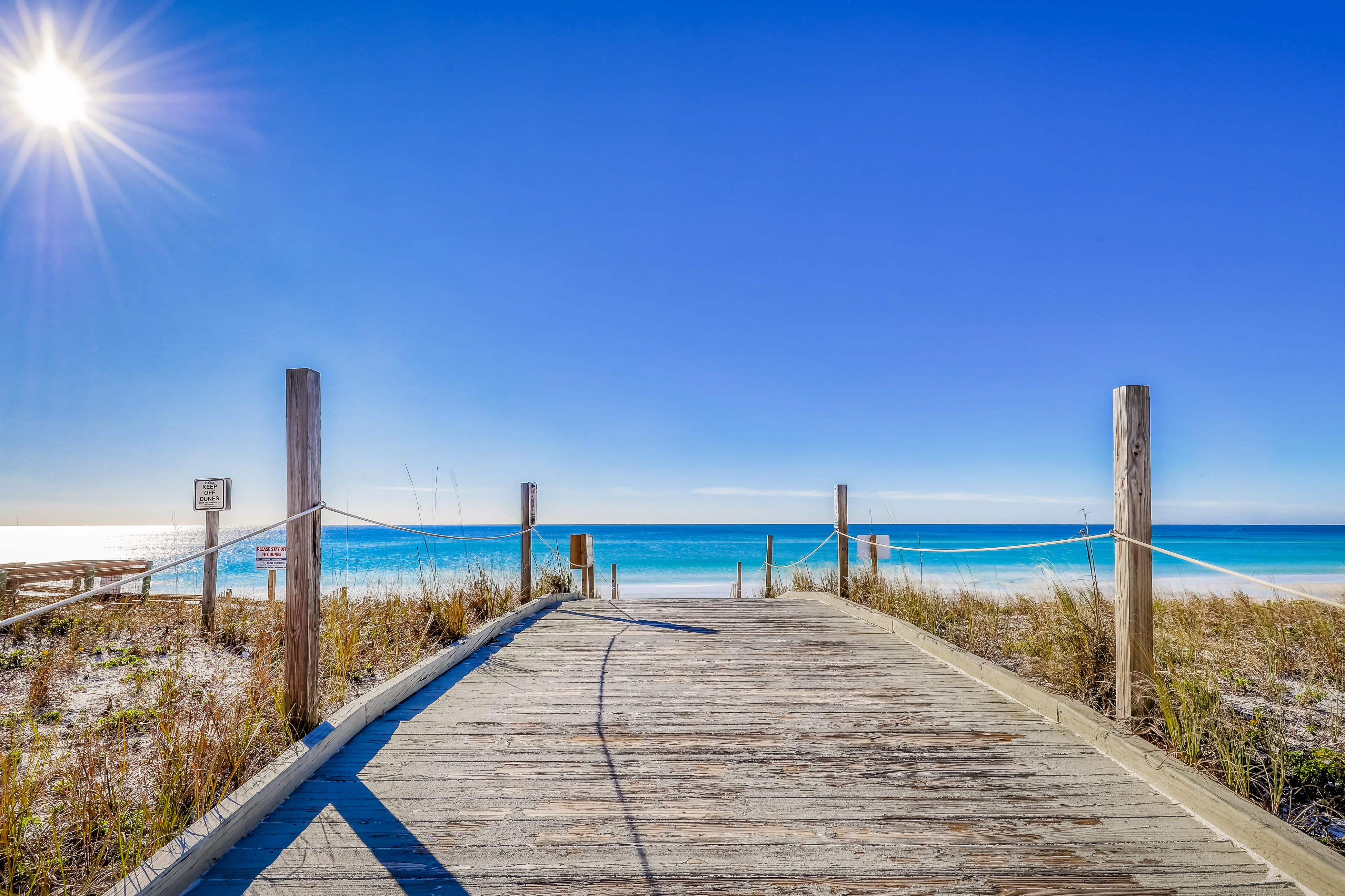 boardwalk leads to beach in Destin, FL