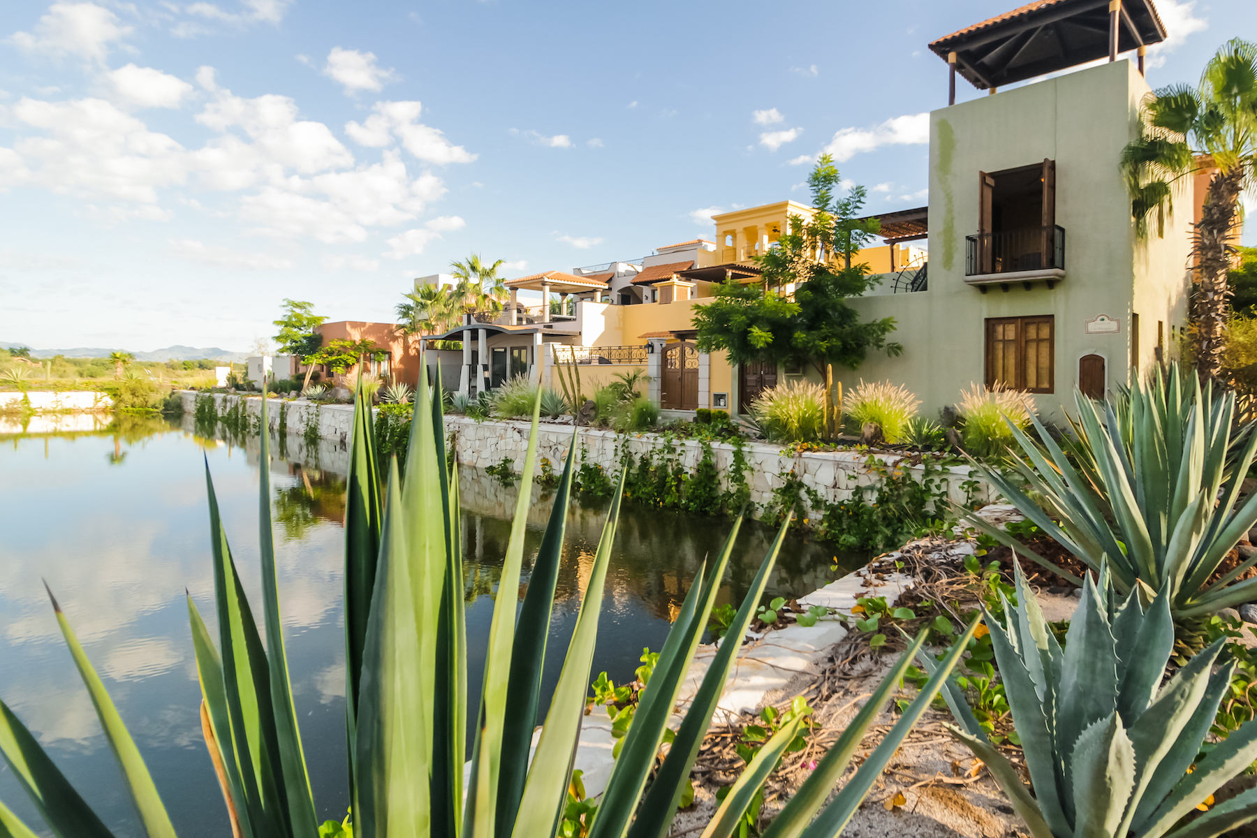 Spanish style vacation rental in Baja California near a body of water.