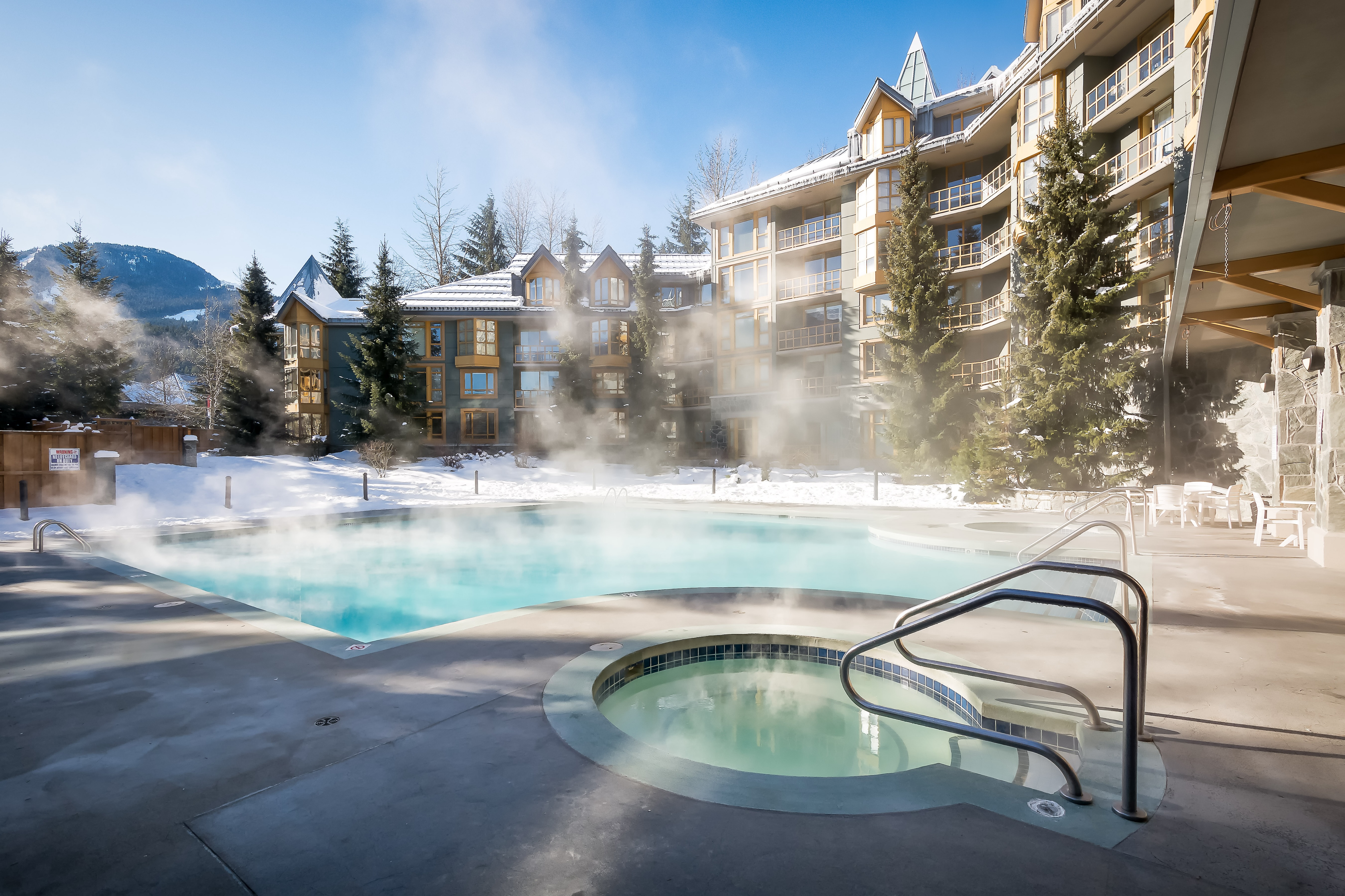 whistler cascade lodge pool and hot tub at winter time
