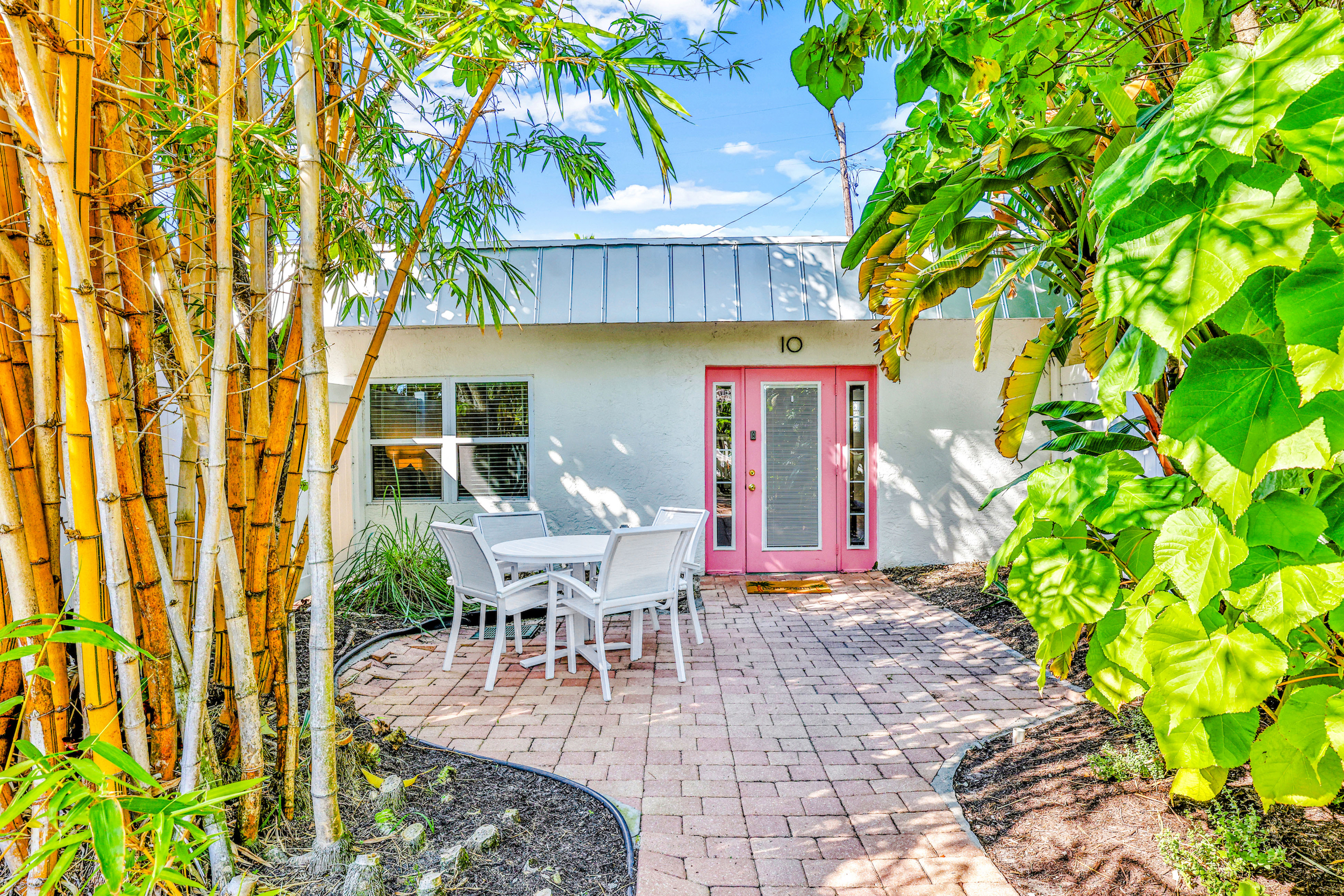 Sunrise Garden Resort rental with pink door on Anna Maria Island, FL