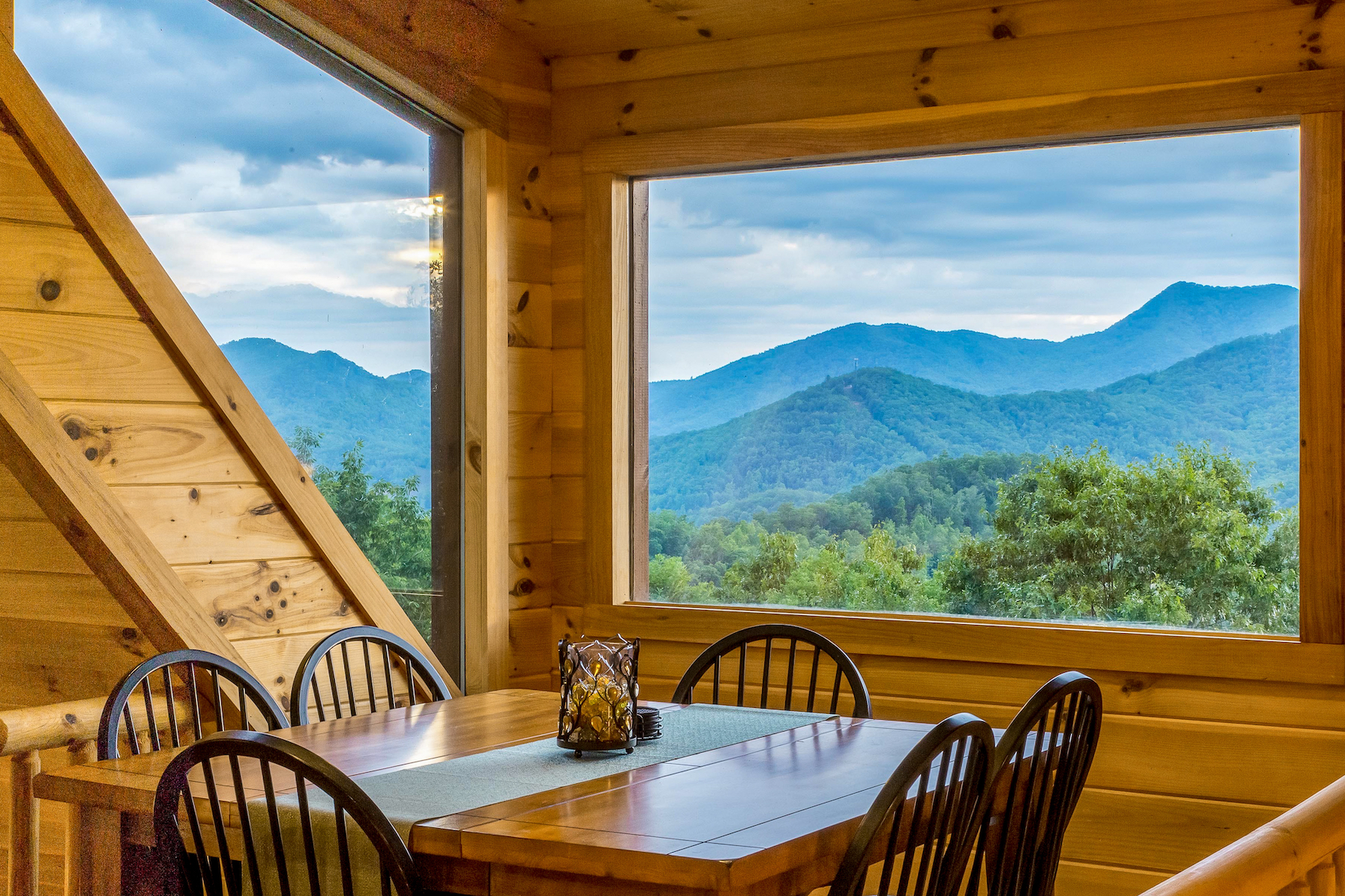 Dining room overlooking mountains at a vacation rental in Sylva, North Carolina.