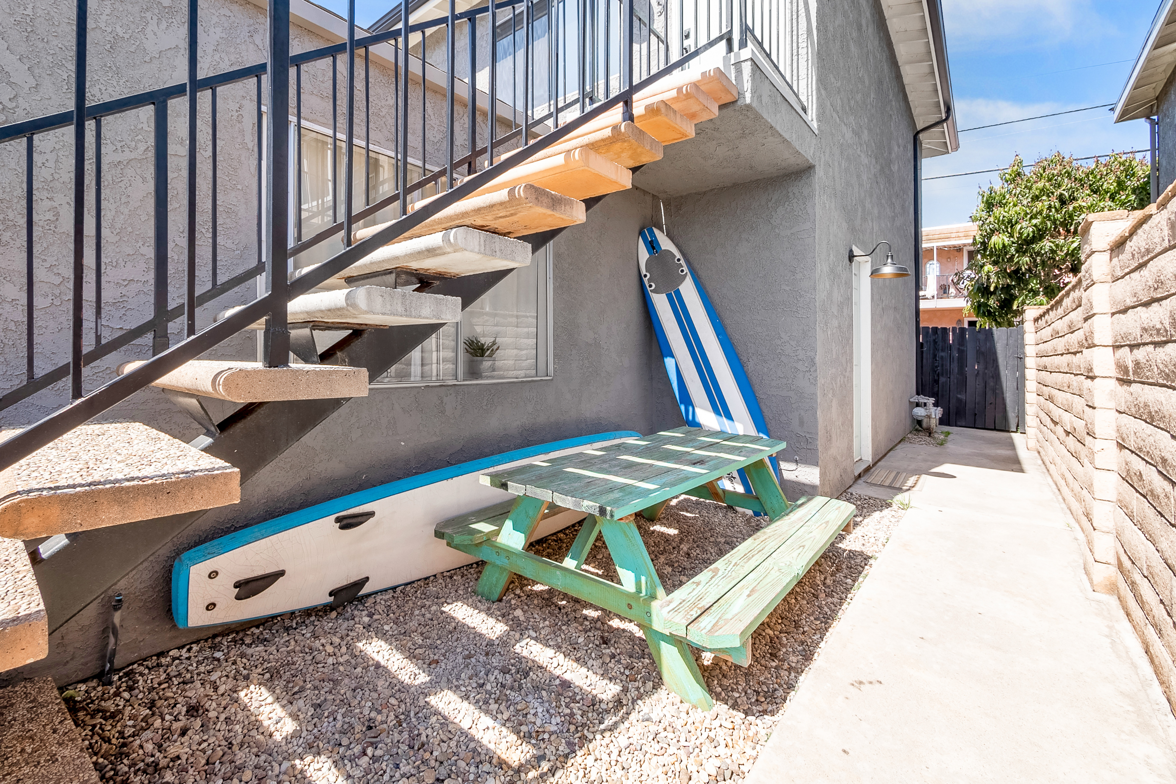 Best beach house amenities for vacation rentals: surf boards.