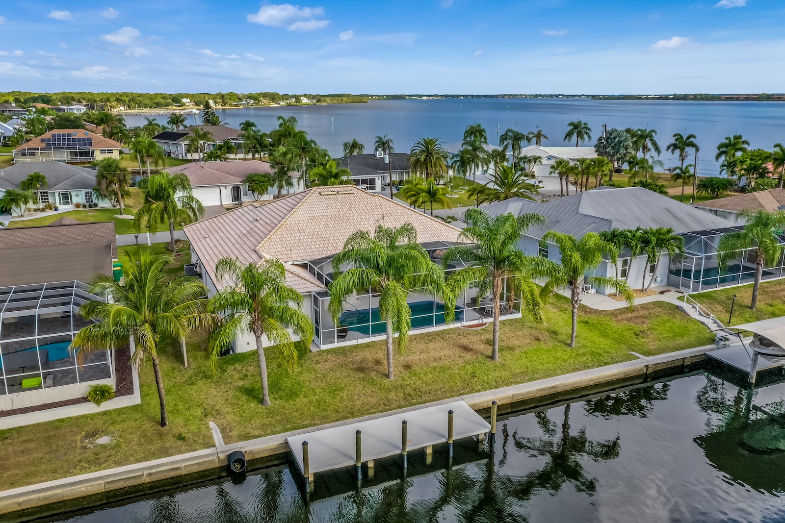 Drone shot of a vacation rental in Port Charlotte, FL on the canal.