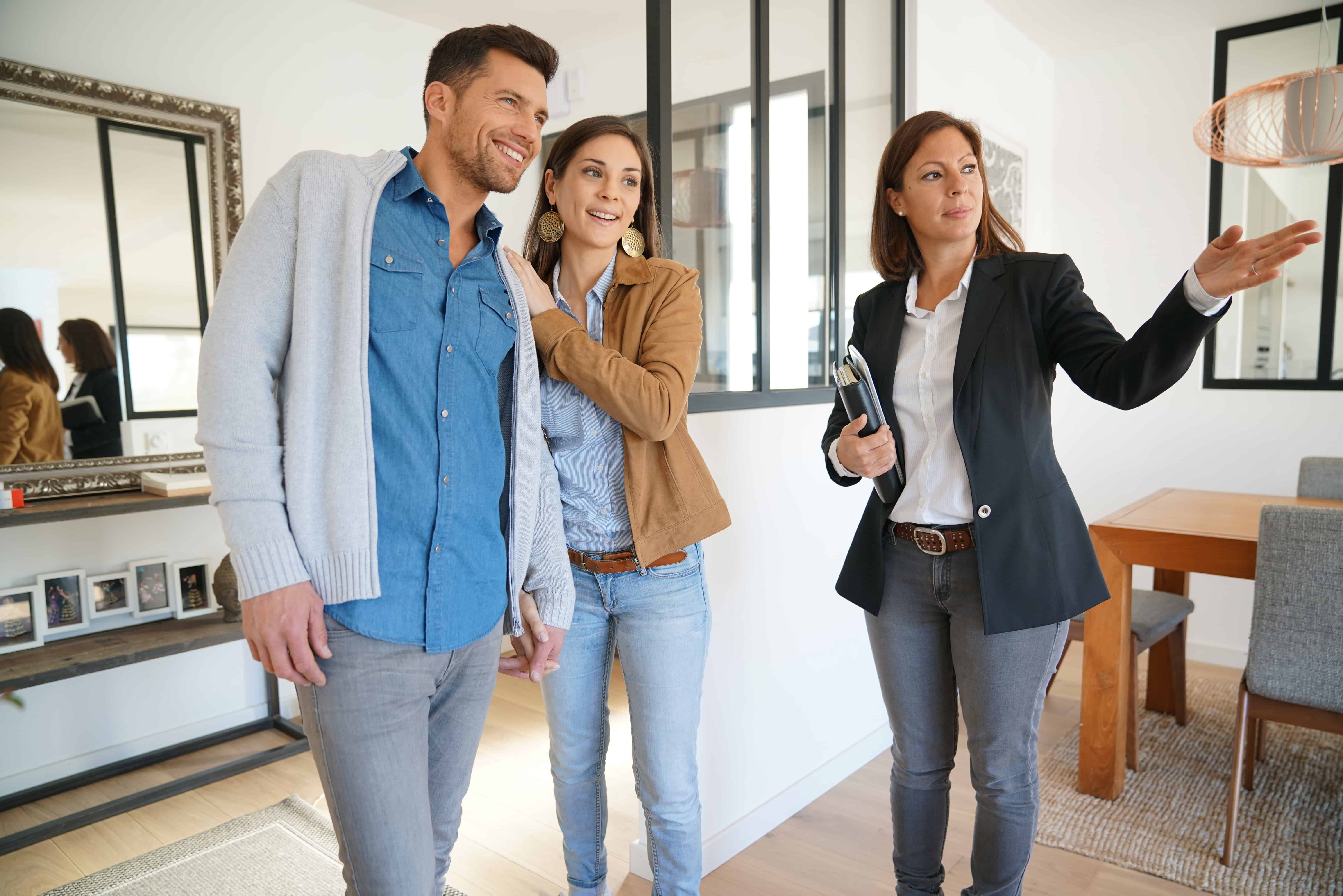 a real estate agent showing a home