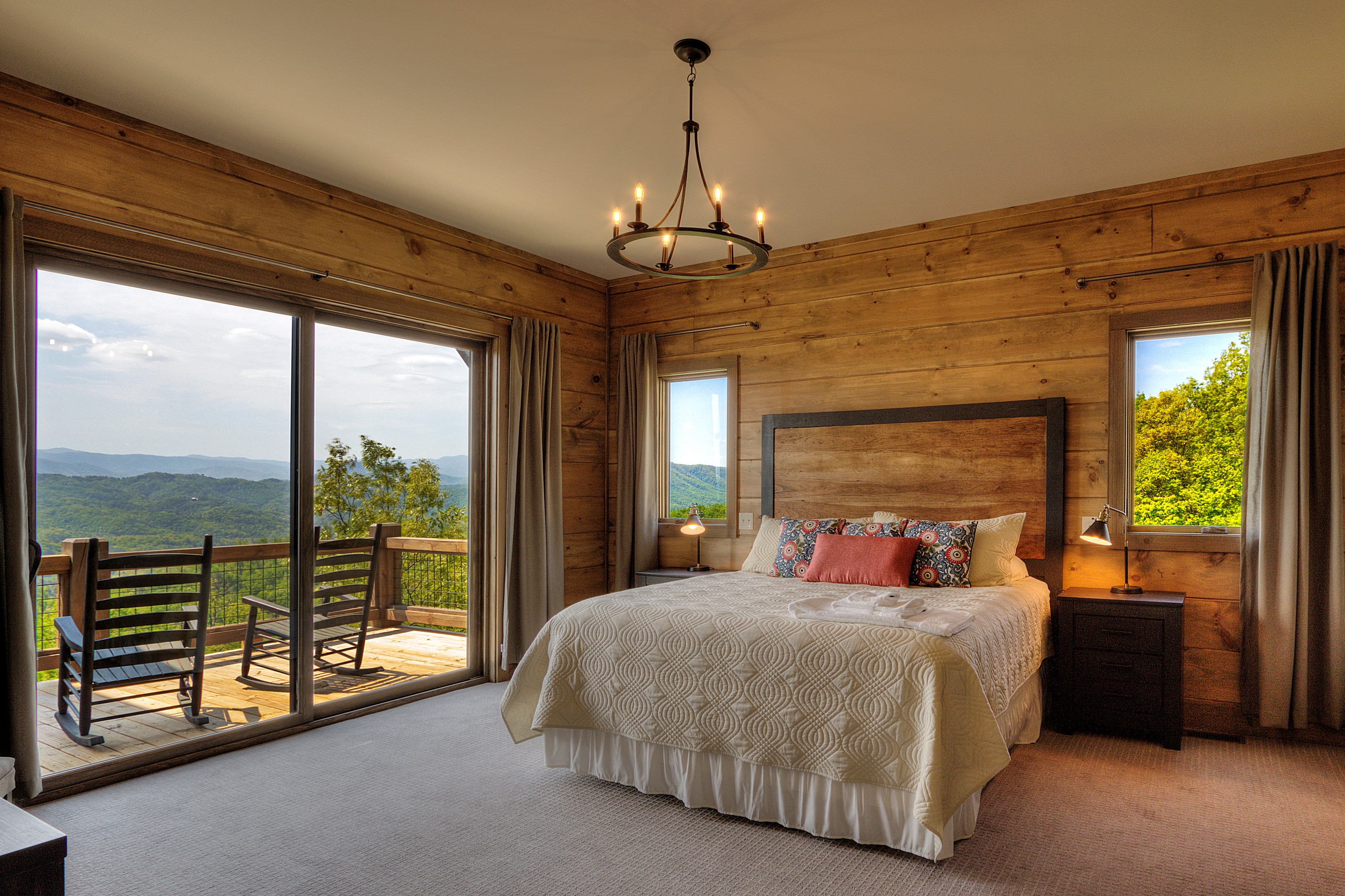 Wood rustic style bedroom with a mountain view deck in Sevierville, TN
