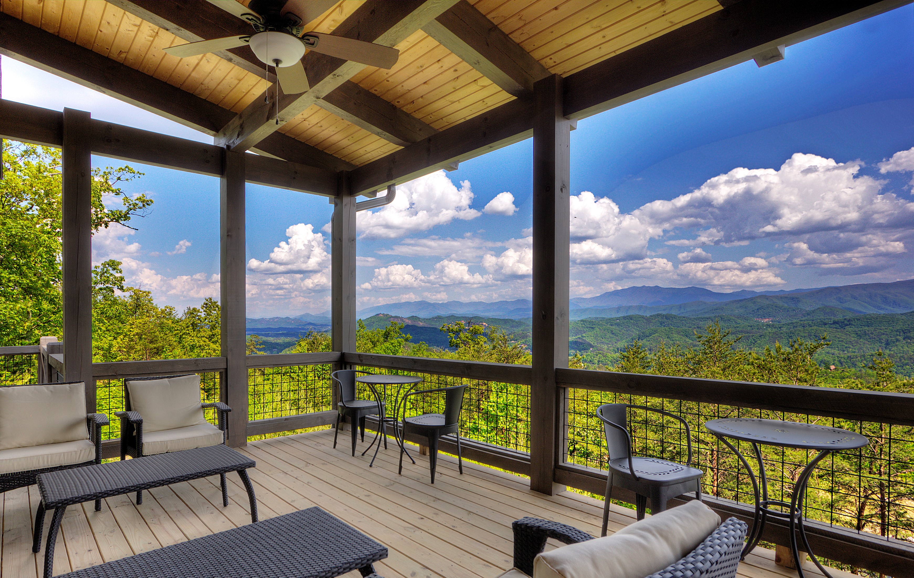 Outdoor deck with modern furniture and mountain views in Sevierville, TN
