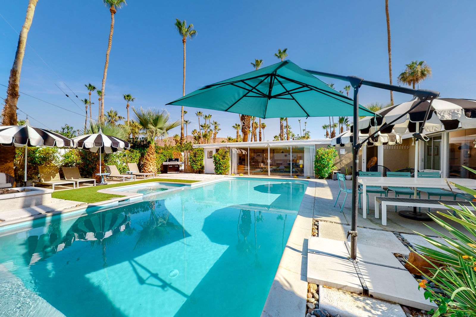 The back pool area of a vacation rental in Palm Springs, CA.