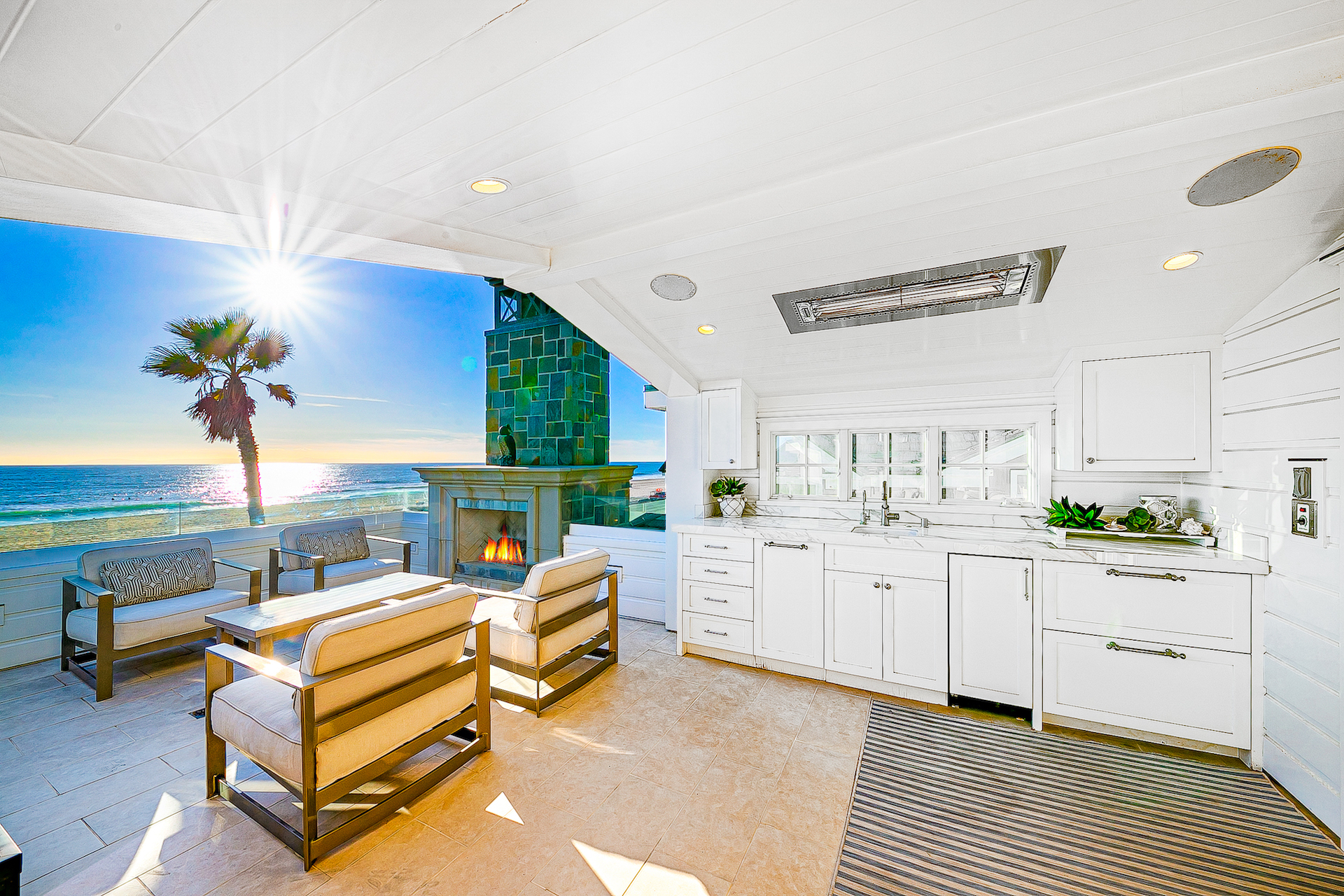 The interior and exterior of an luxury ocean front vacation rental in Newport Beach, CA.