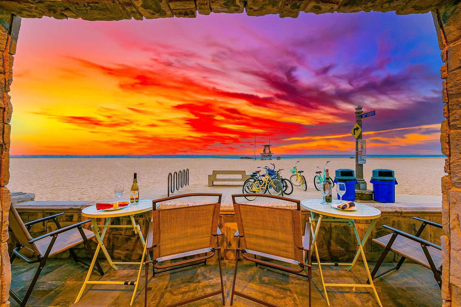 The back patio of a Newport Beach, CA vacation rental during a sunset.
