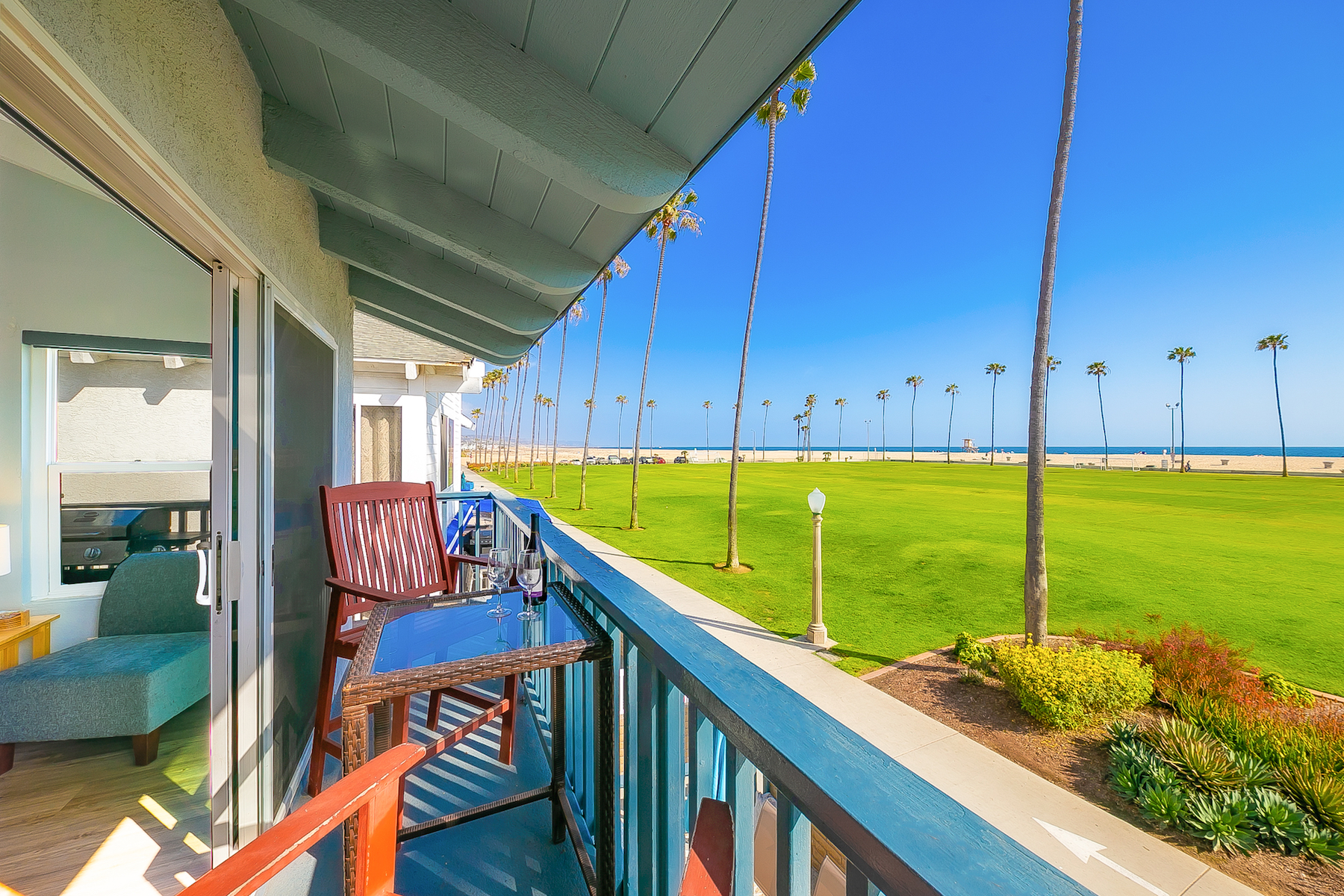 The terrace of a vacation rental in Newport Beach, CA overlooking the beach.