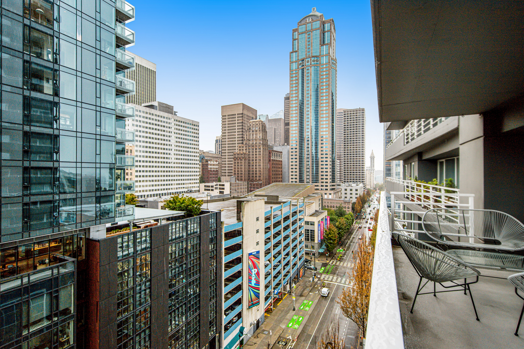 The balcony of a vacation rental in Seattle overlooking the street.
