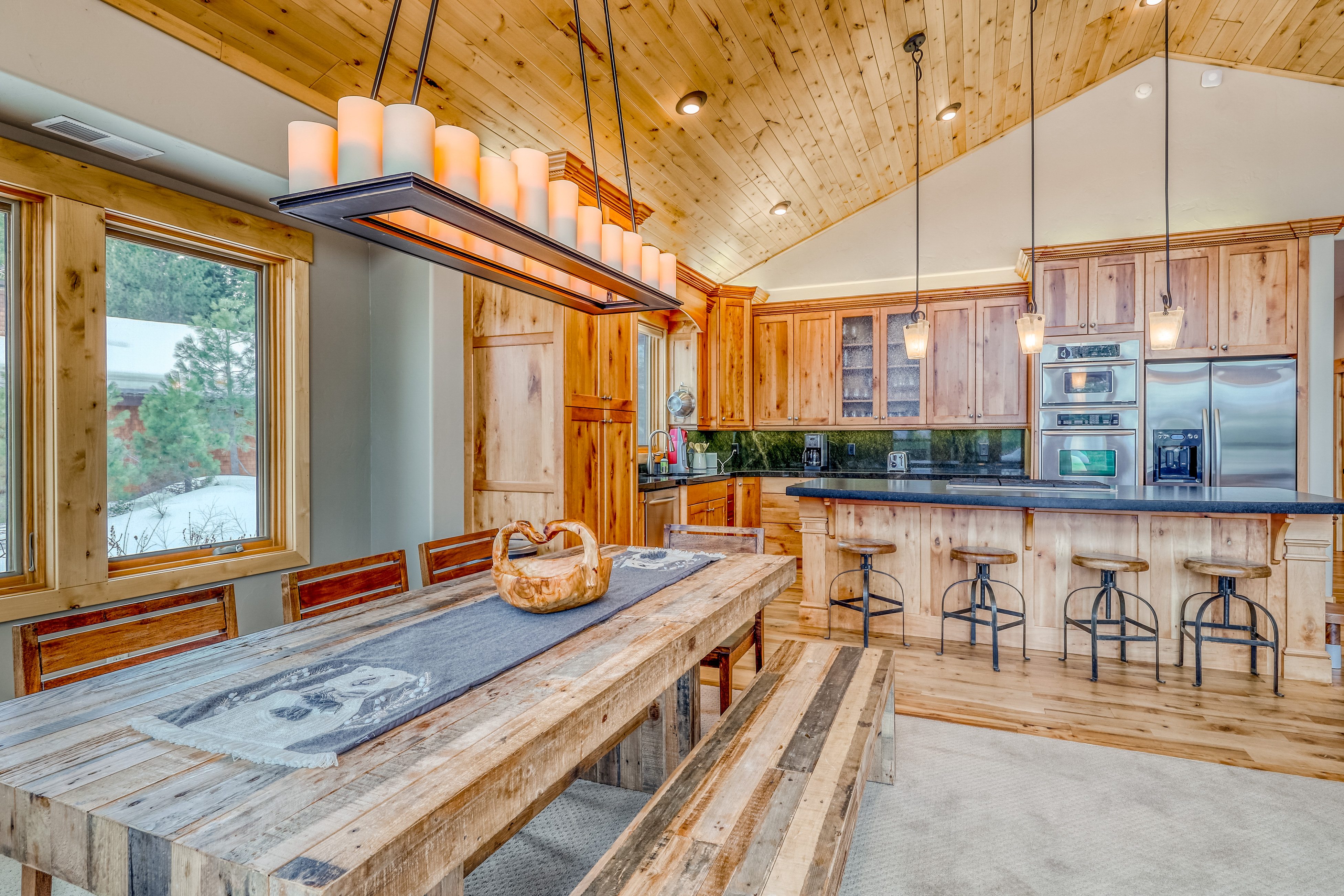 kitchen of tahoe cabin with open layout and wood accents