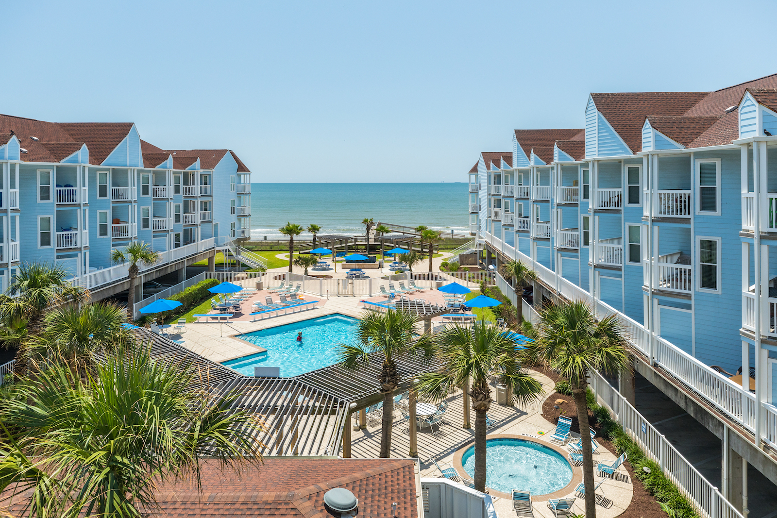The pool area and ocean view at the SeaScape Condos in Galveston.