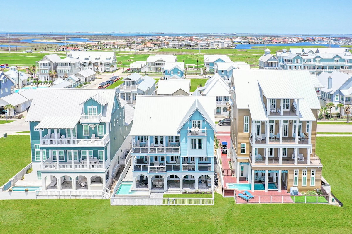 View of three large homes in Texas.