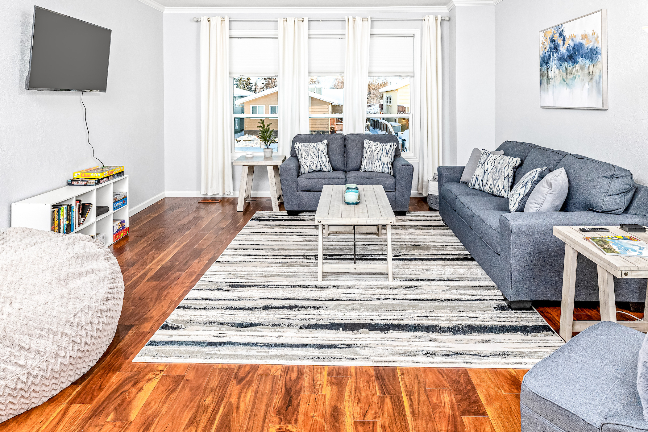 A living room with charming decorations at a vacation rental in Anchorage, Alaska.