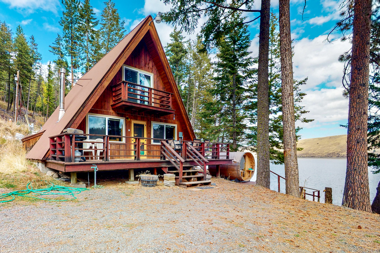 The exterior of an a-frame cabin rental overlooking Wallowa Lake in Joseph, OR.