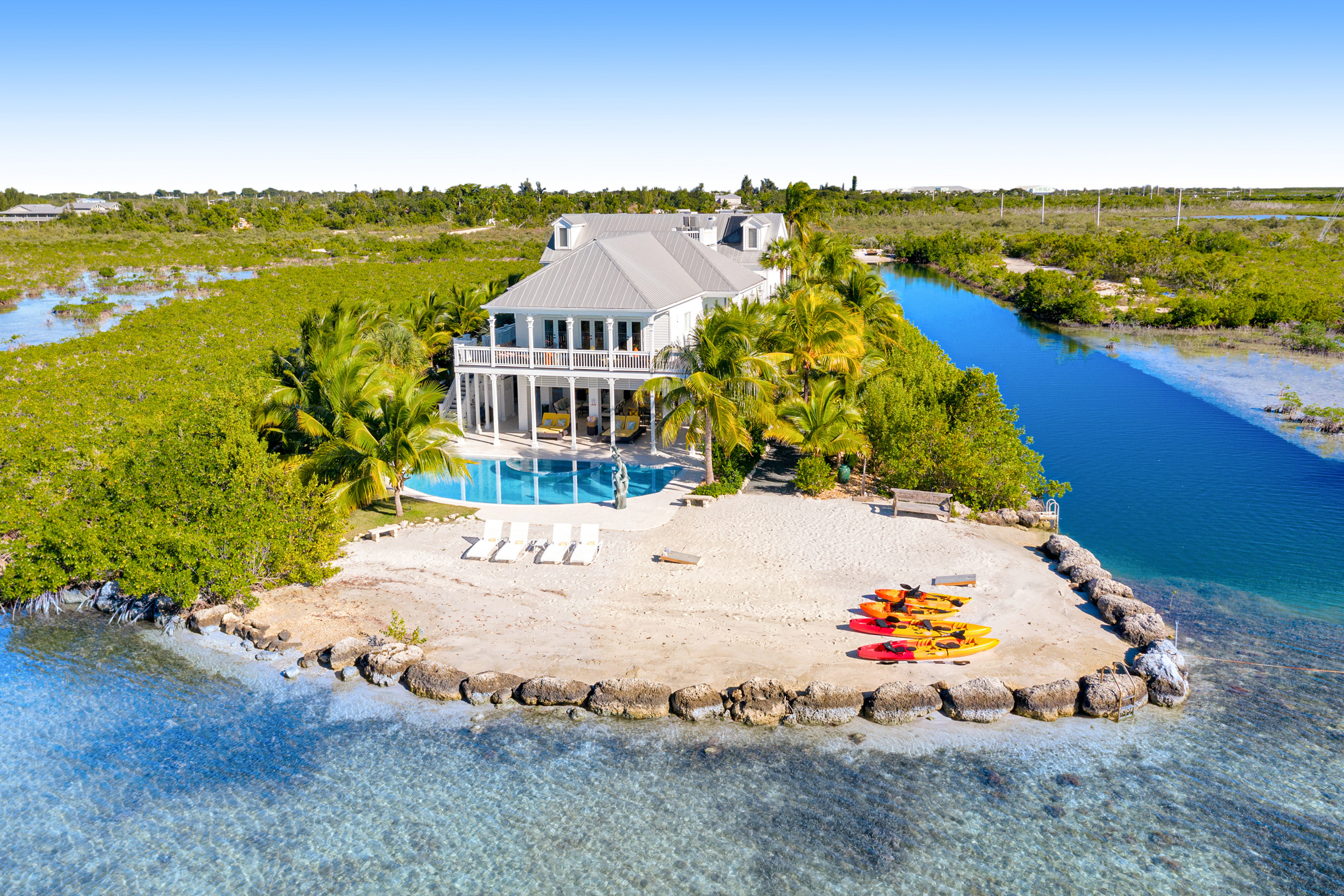 large home with private beach, pool, and kayaks in sugarloaf key