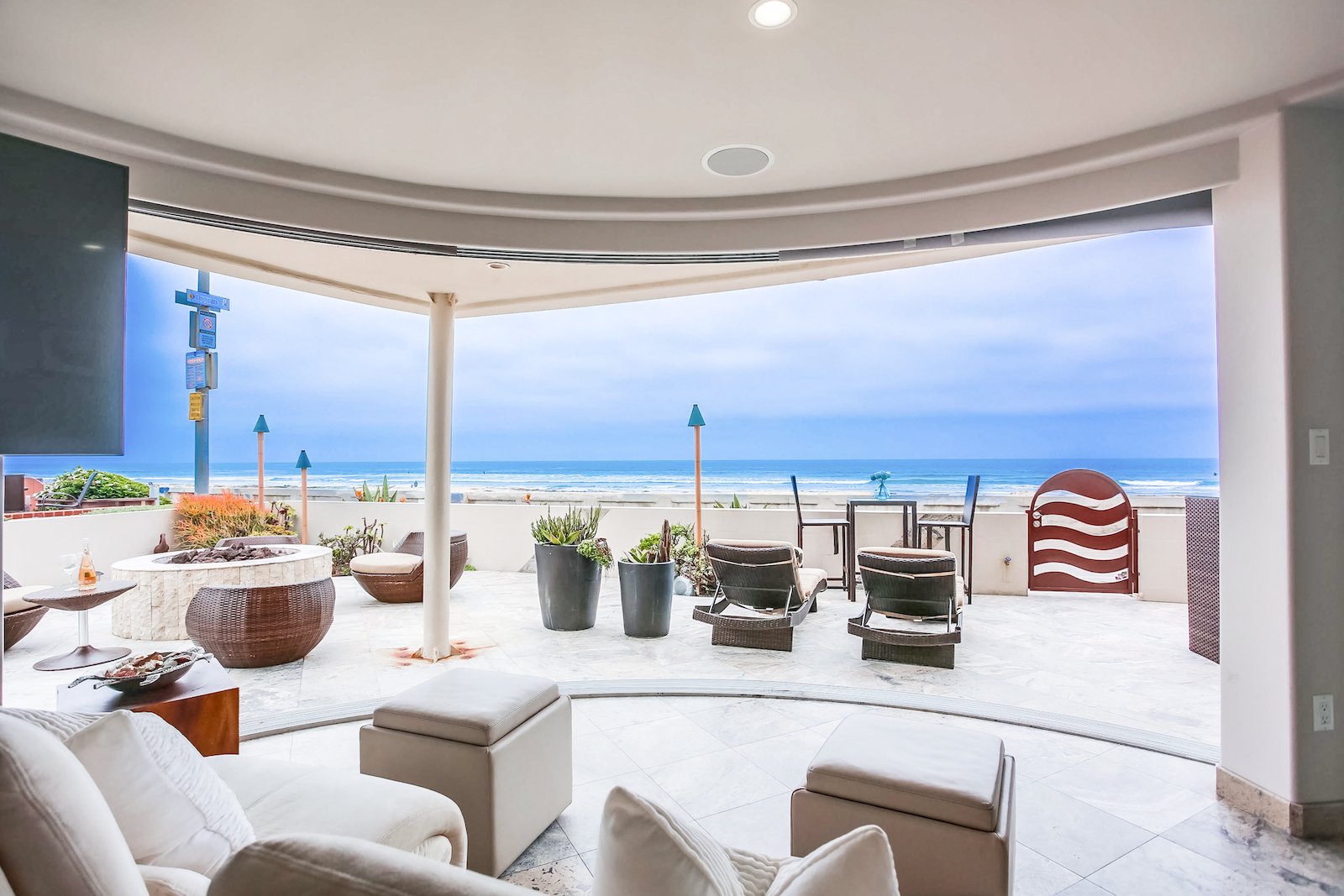 The living area overlooking the beach at a vacation rental in San Diego, CA