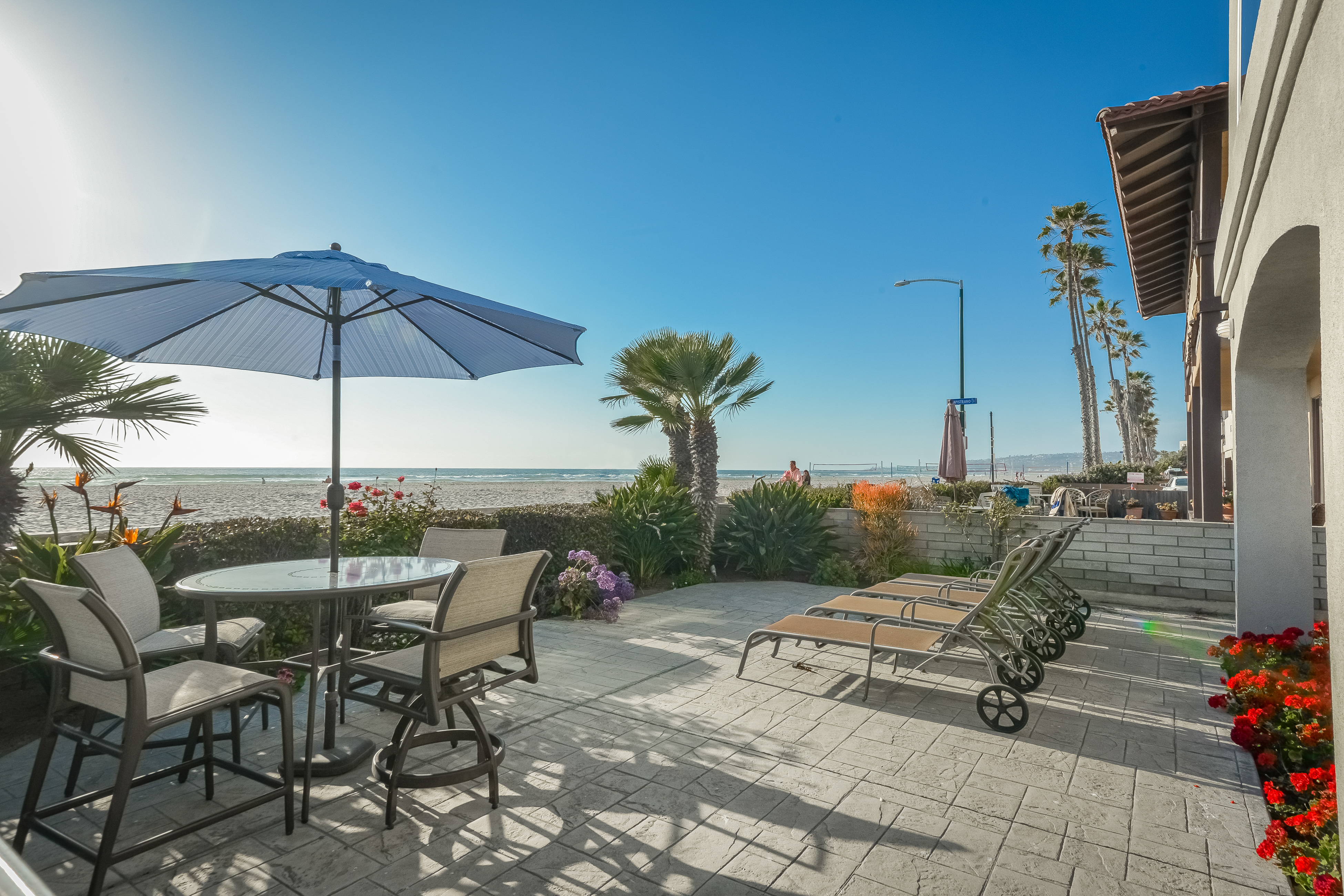 The deck of a vacation rental in San Diego, CA overlooking the beach.