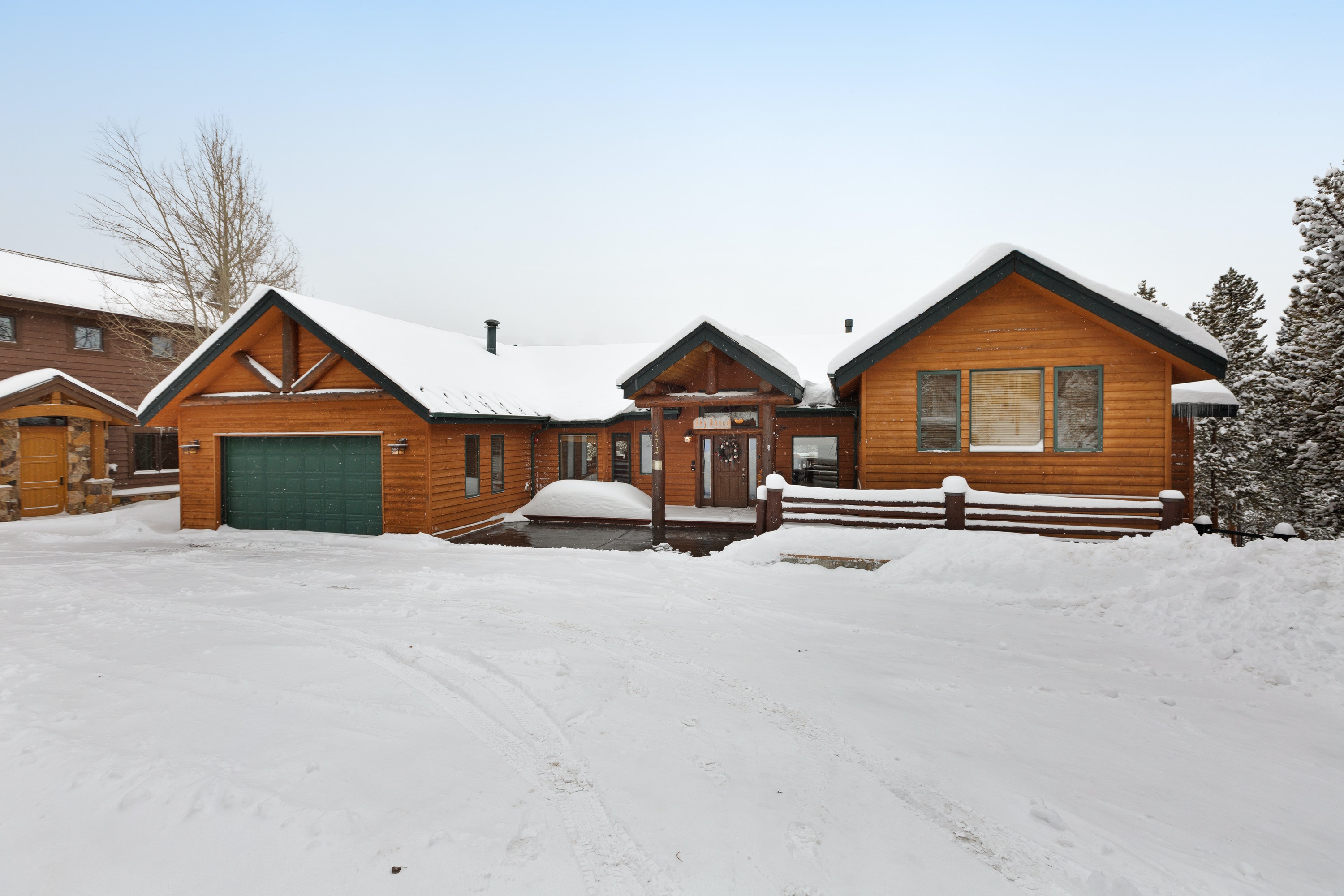 vacation cabin with green garage door in breckenridge, co