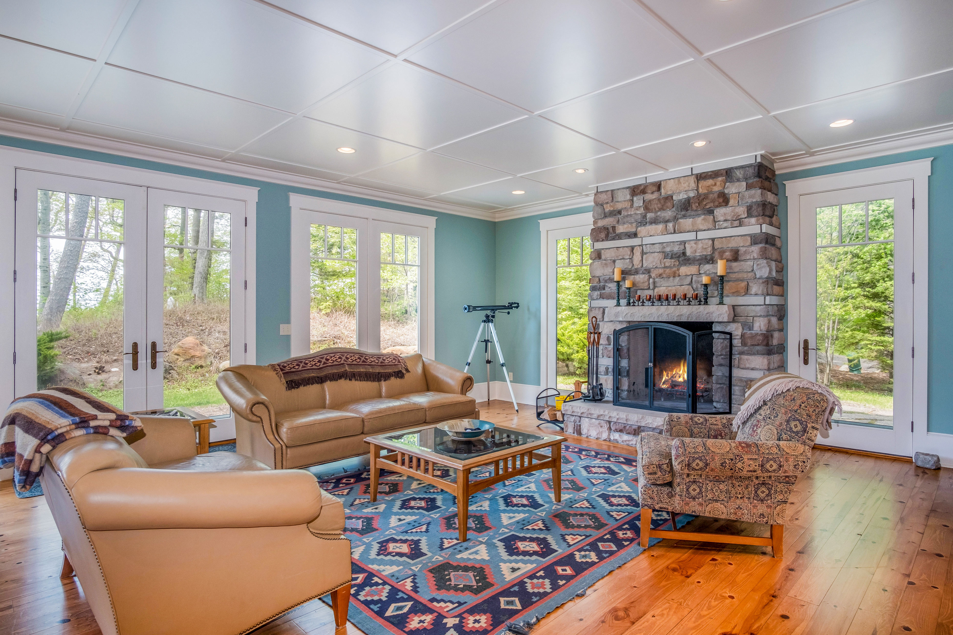 Indoor fireplace at a vacation home in Frankfort, MI