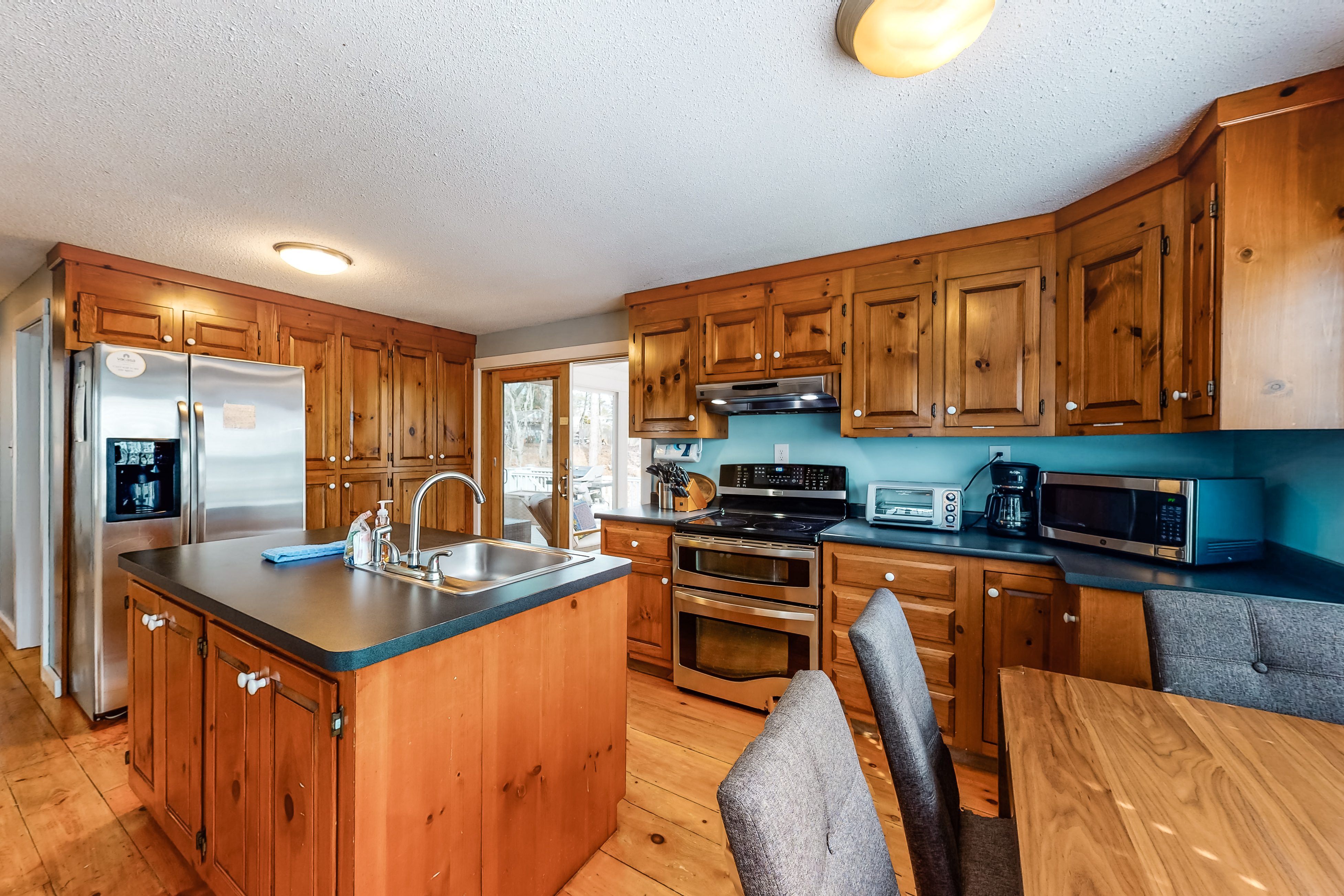 The kitchen of a vacation rental in Cape Cod, MA