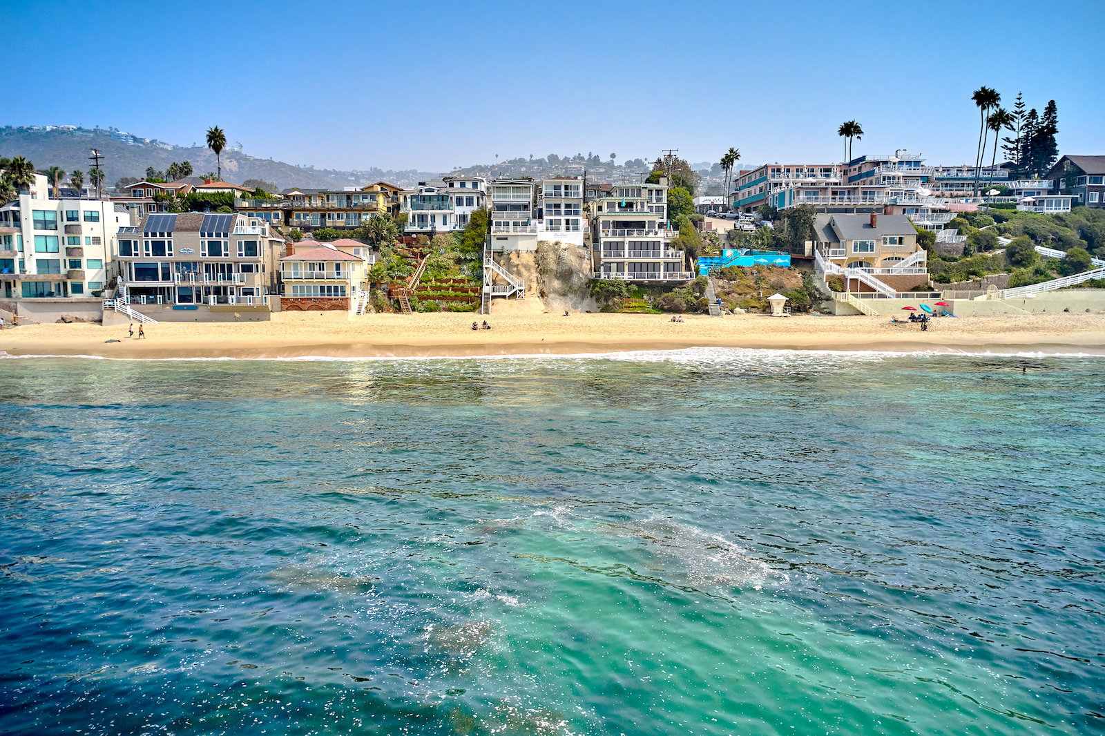 The Laguna Beach coastline lined with vacation rentals.