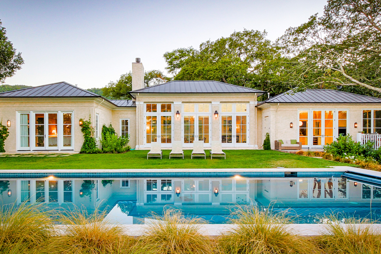 The backyard of a vacation rental in Sonoma with a pool.