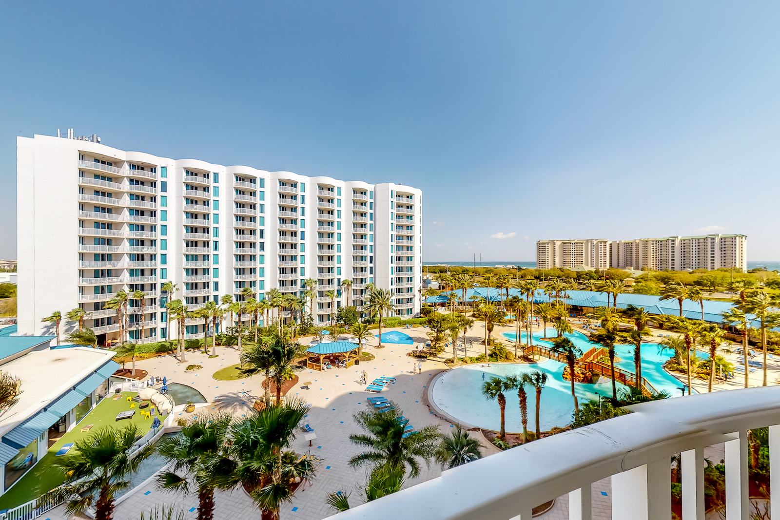 The view from a balcony overlooking the pools at Palms of Destin Resort.