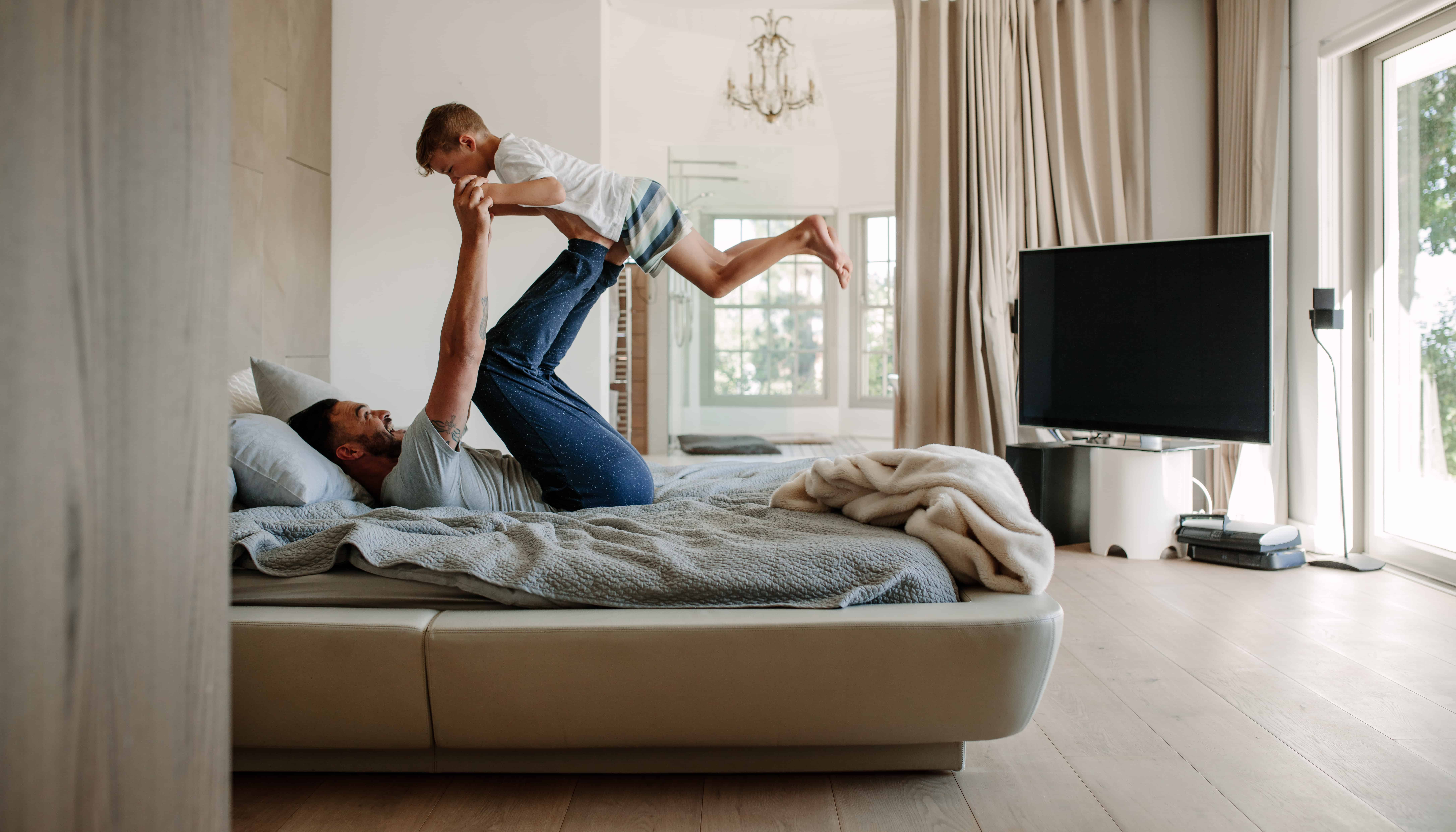a father playing with his son