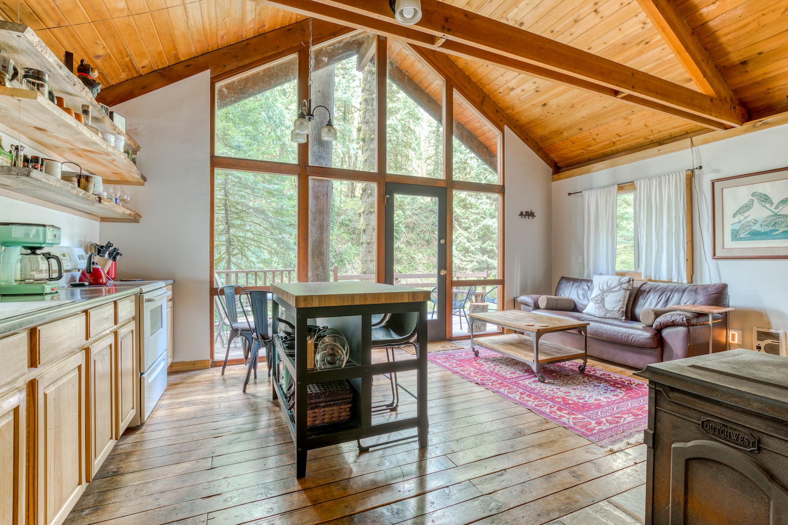 The living area of a cabin rental in Rhododendron, OR.