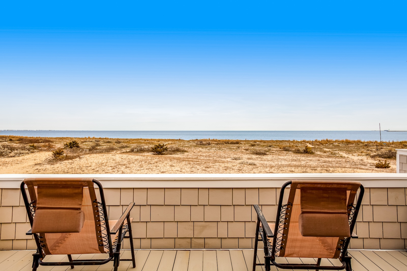 The view of the coast from the balcony of a vacation rental in Lewes, DE.