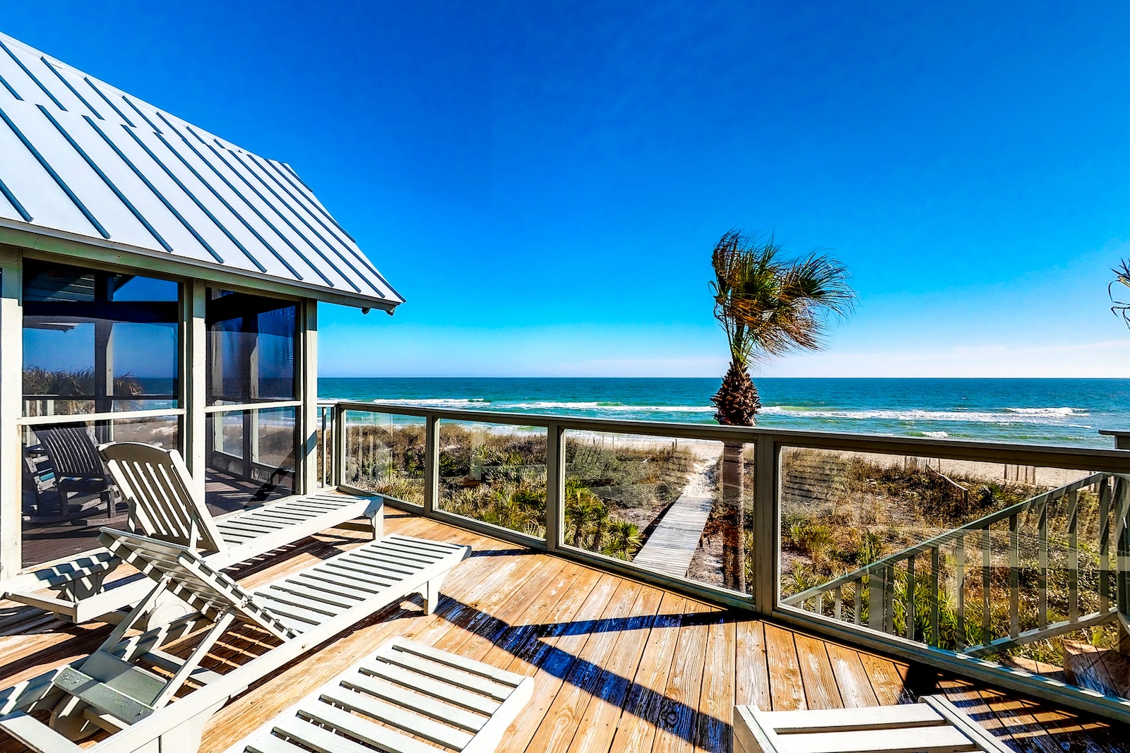 The view from the back deck overlooking the ocean at a St. George Island, FL rental.