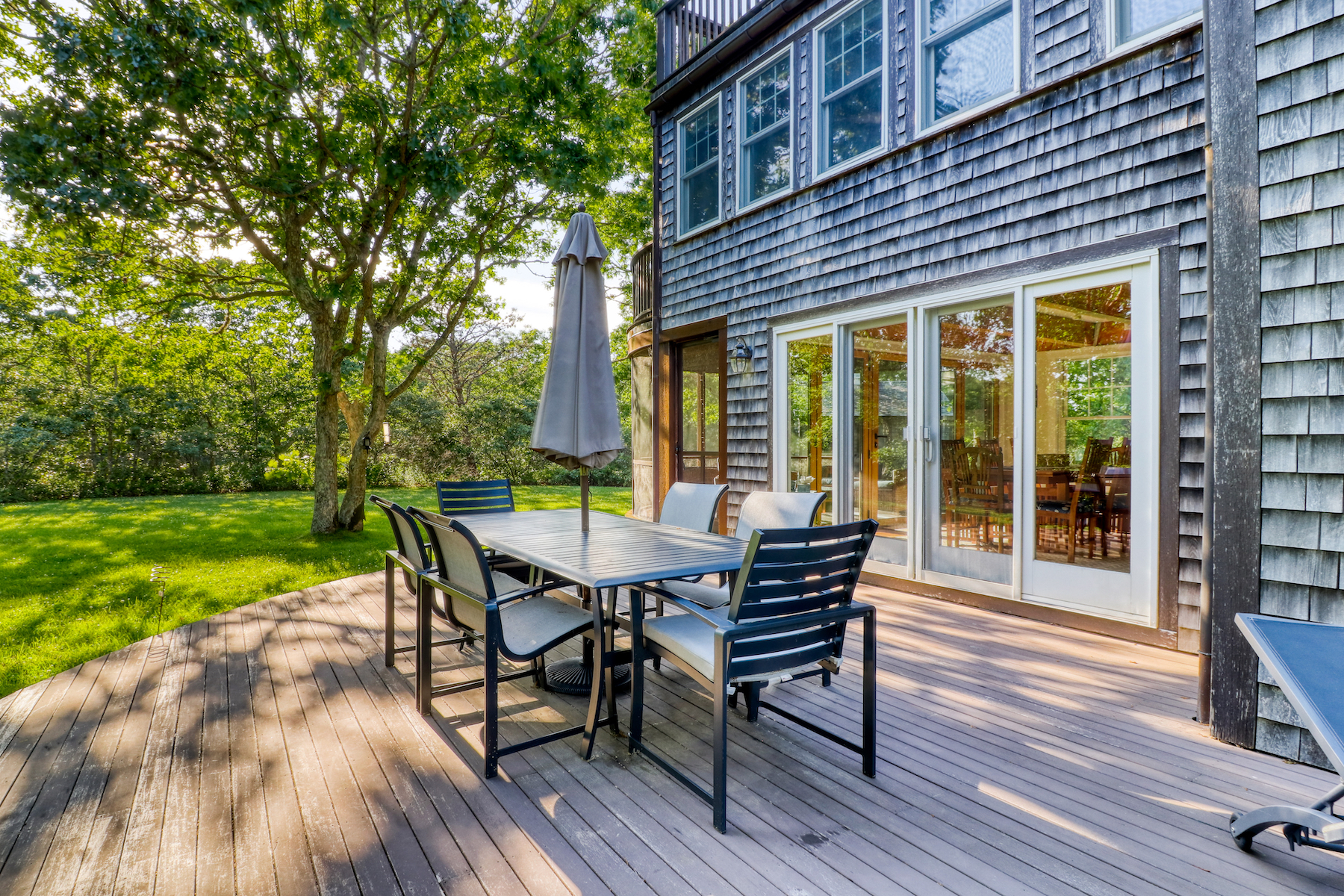 The outdoor patio of a Martha&#x27;s Vineyard vacation rental in West Tisbury, MA